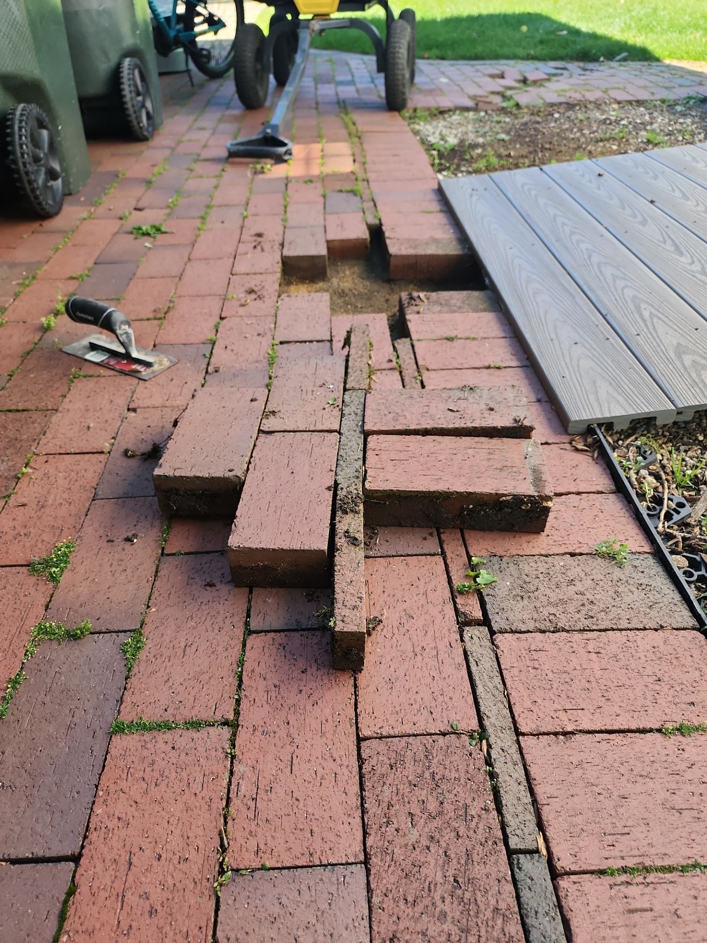 Brick paver repair, cleaning and sealing by Northern Power Washing LLC.