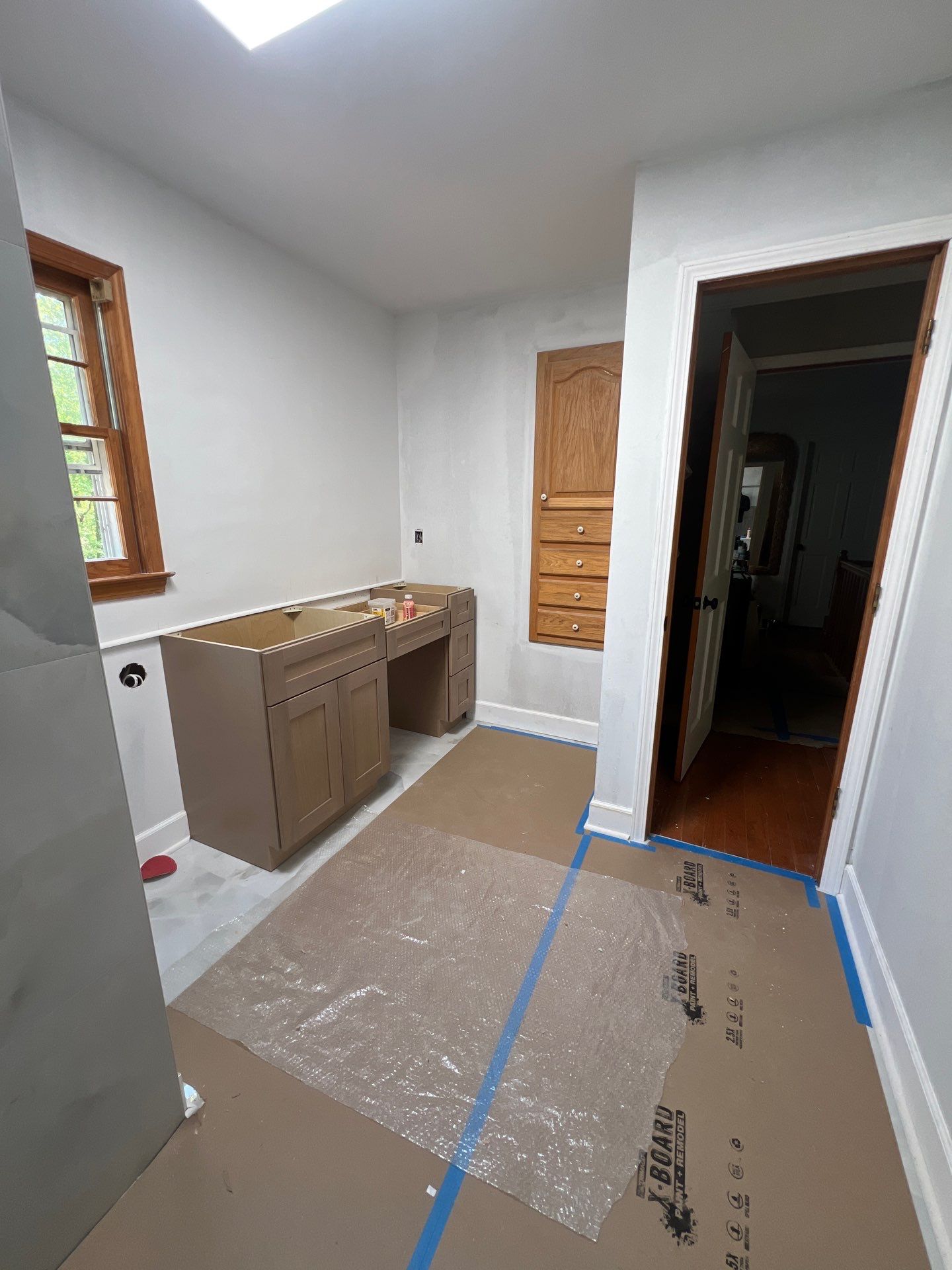 Modern Bathroom Remodeling Featuring Marble Tiles and Custom Cabinetry in Smyrna by Swift Home Renovations