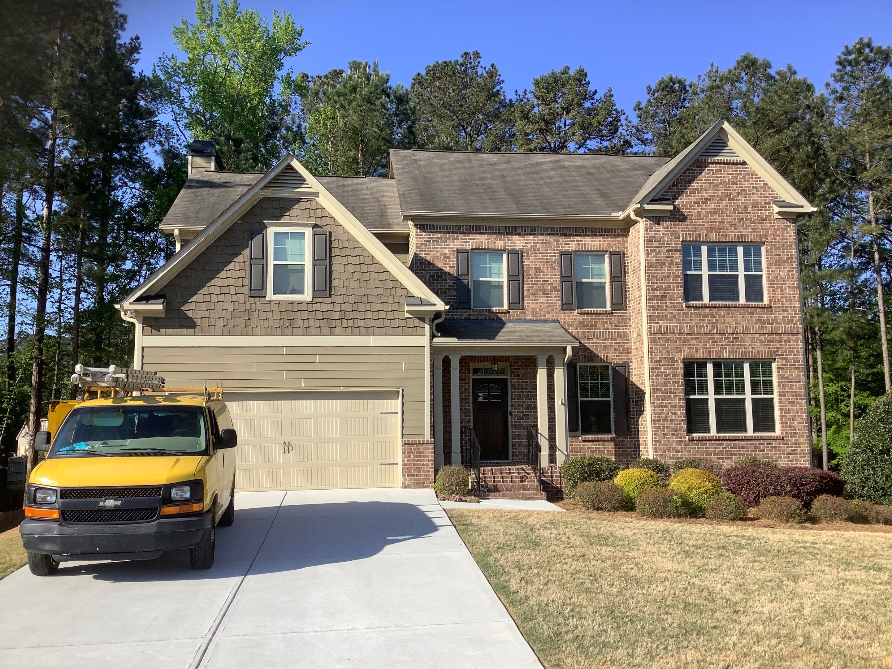 Multi-Surface Exterior Painting for Two-Story Residence in Powder Springs by Swift Home Renovations
