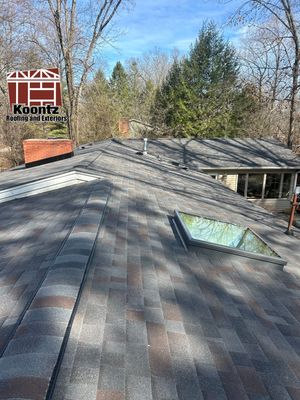 Residential Roofing Installation using Malarkey Vista AR Shingles (Black Oak)