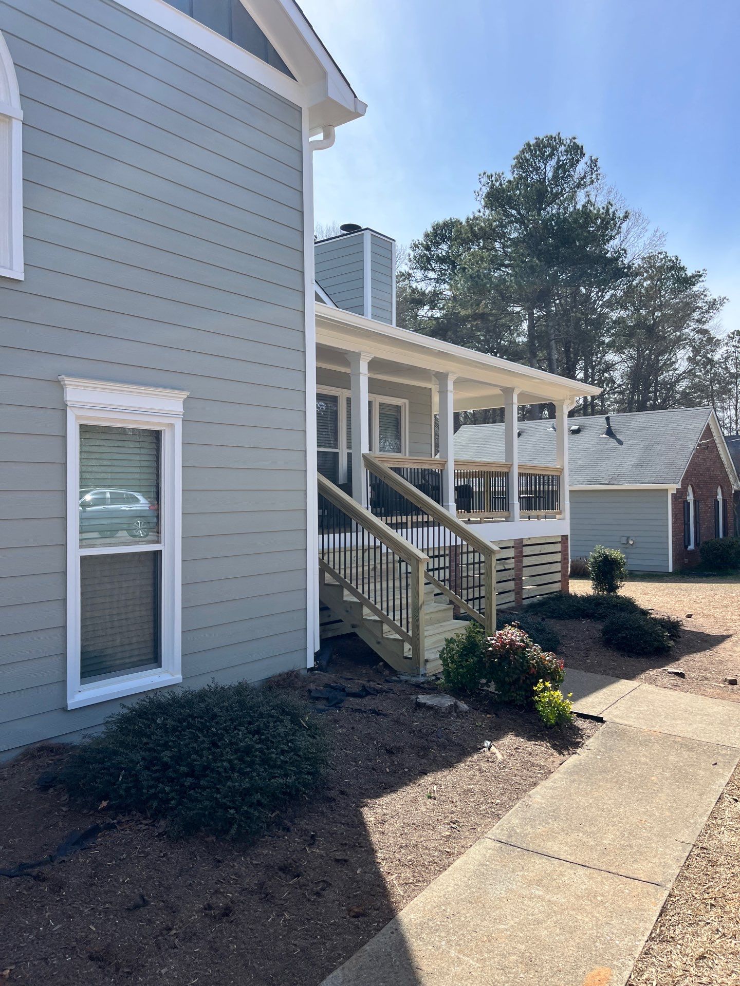 Acworth, GA James Hardie Board and Batten Siding Installation, Porch Renovation, Exterior Painting, and Window Replacement by Nelson Exteriors 