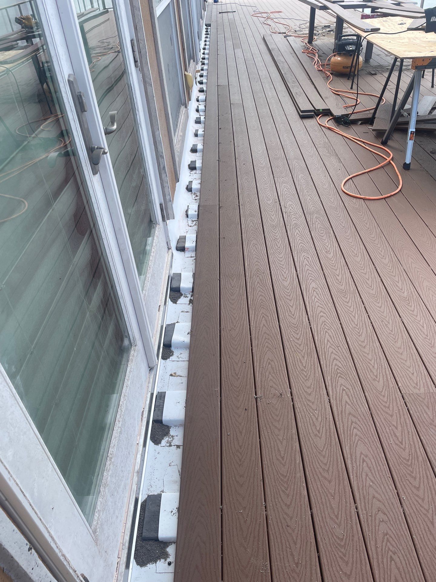 Walk Out Patio Cover by Bayfront Roofing and Construction