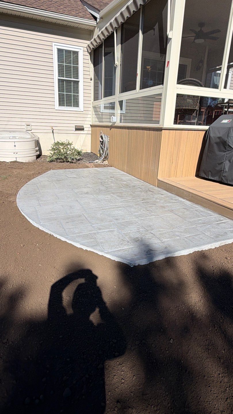 Ashler Slate Stamped Patio by NG Masonry & Construction LLC