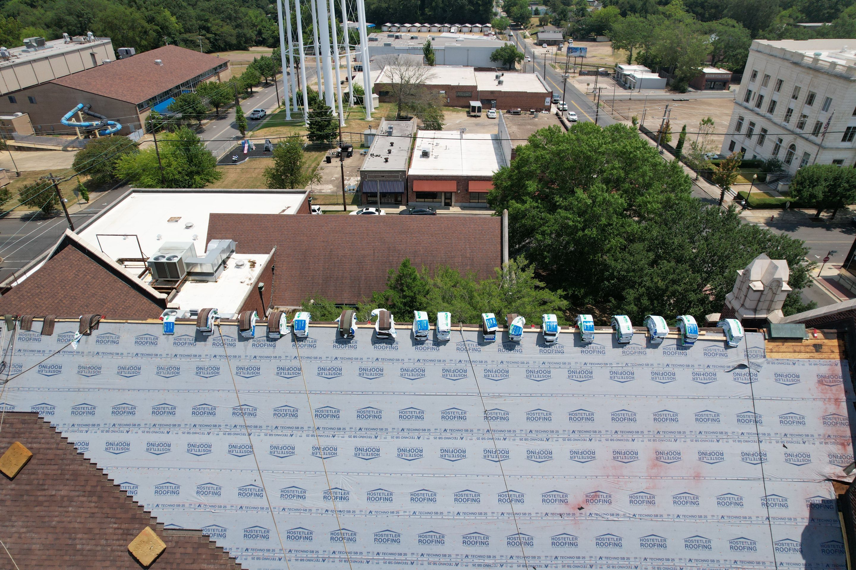 Commercial Roof Replacement using Malarkey Vista Shingles and 50 mil PVC by Hostetler Roofing