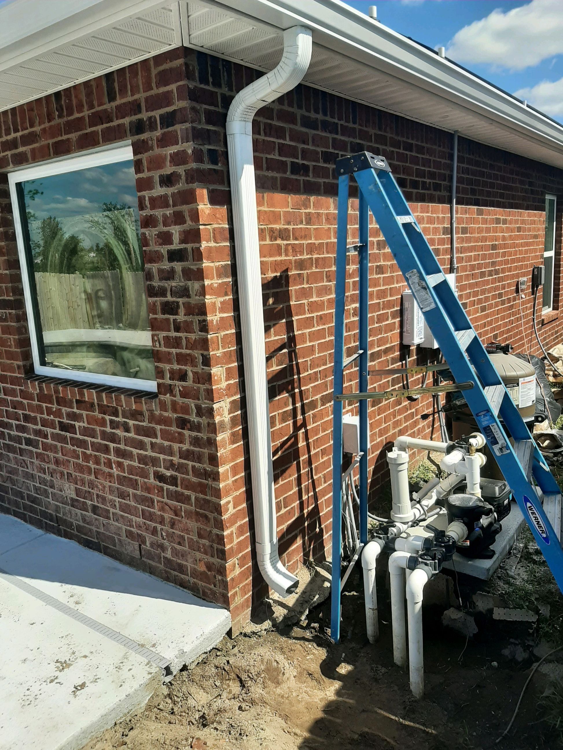 Seamless Gutter Installation using White K-Style Gutters by Gutter Professors