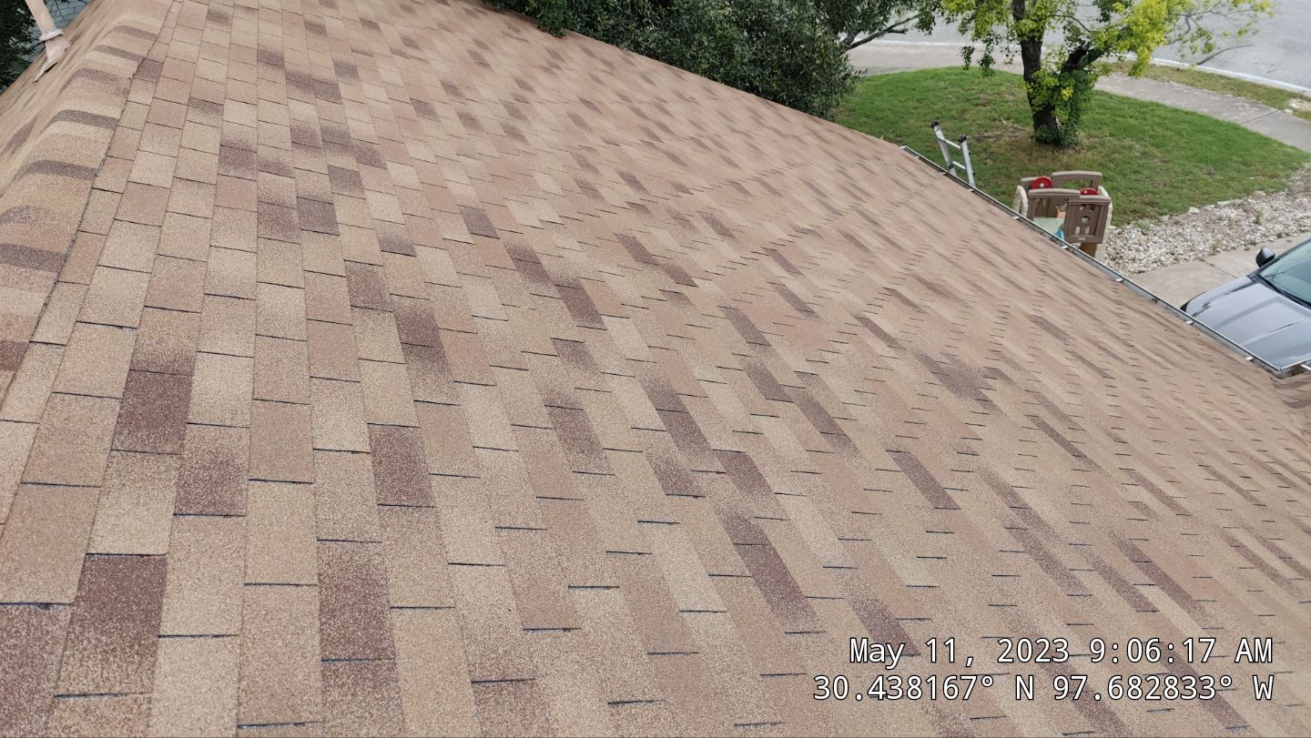 New Roof Installation Of IKO Dynasty Color Brownstone by DeZign Roofing & Exteriors
