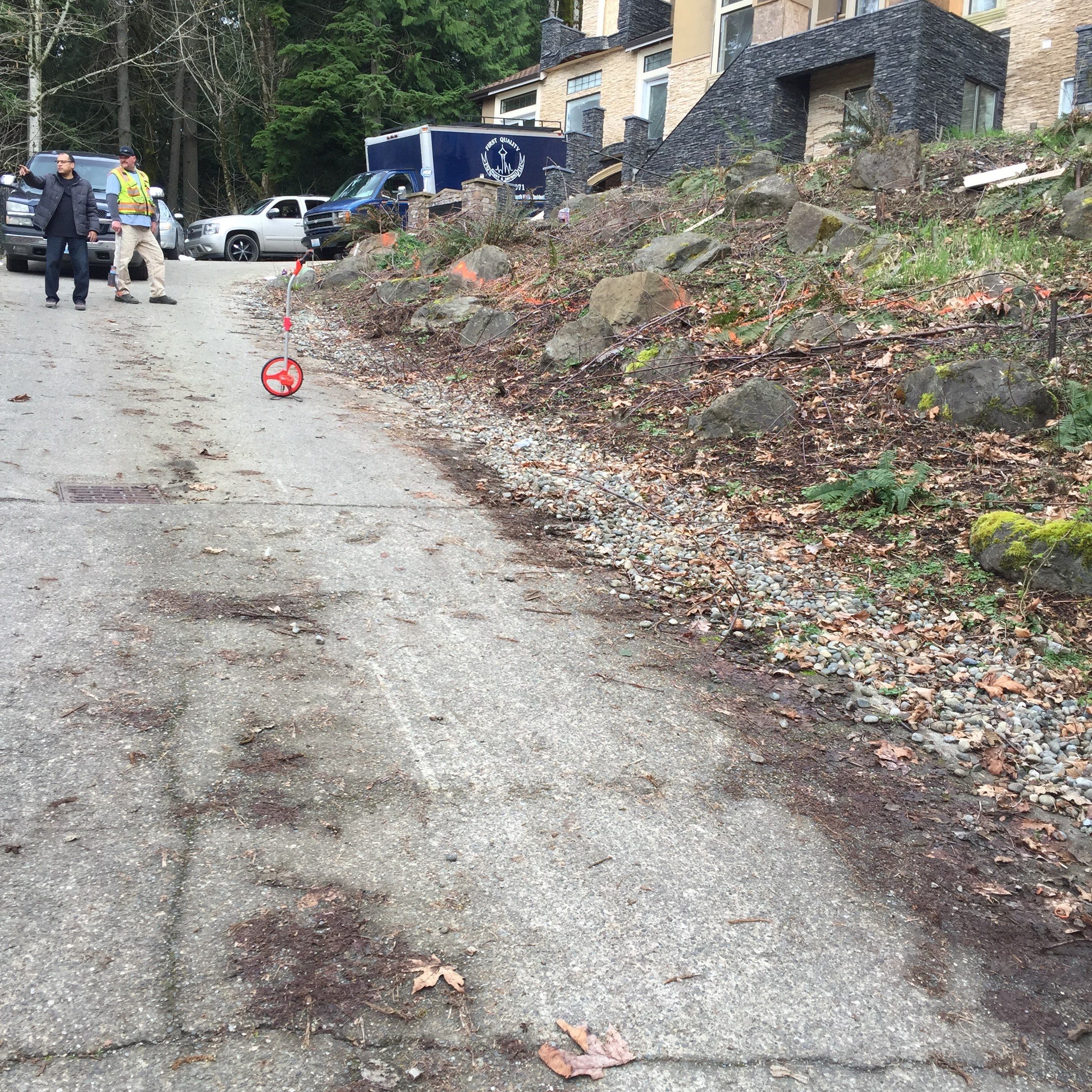 Asphalt Driveway and Stamped Concrete Patio Finish  by Jireh Asphalt & Concrete Inc 