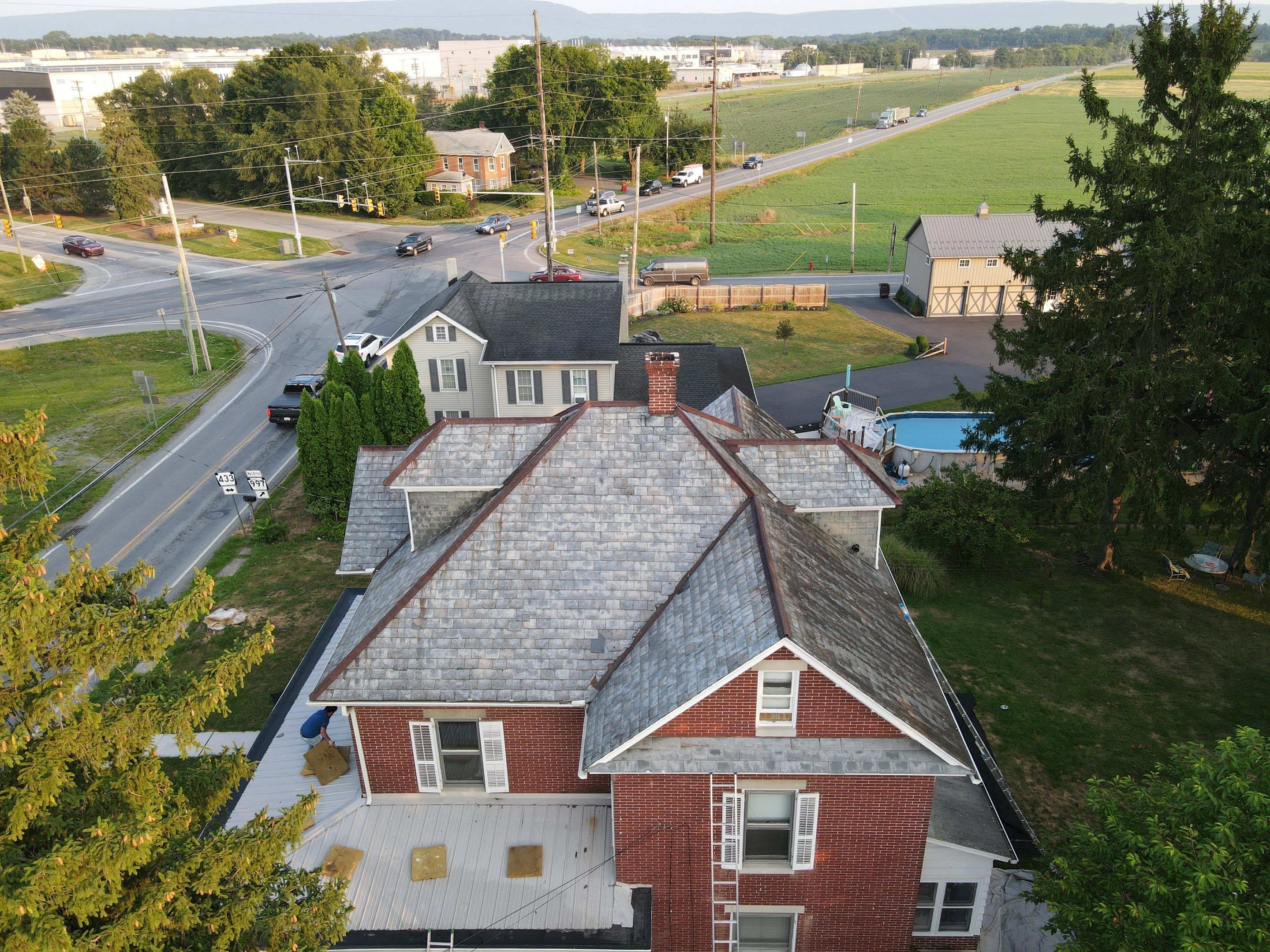 Slate Roof Removal  by Teflon Roofing
