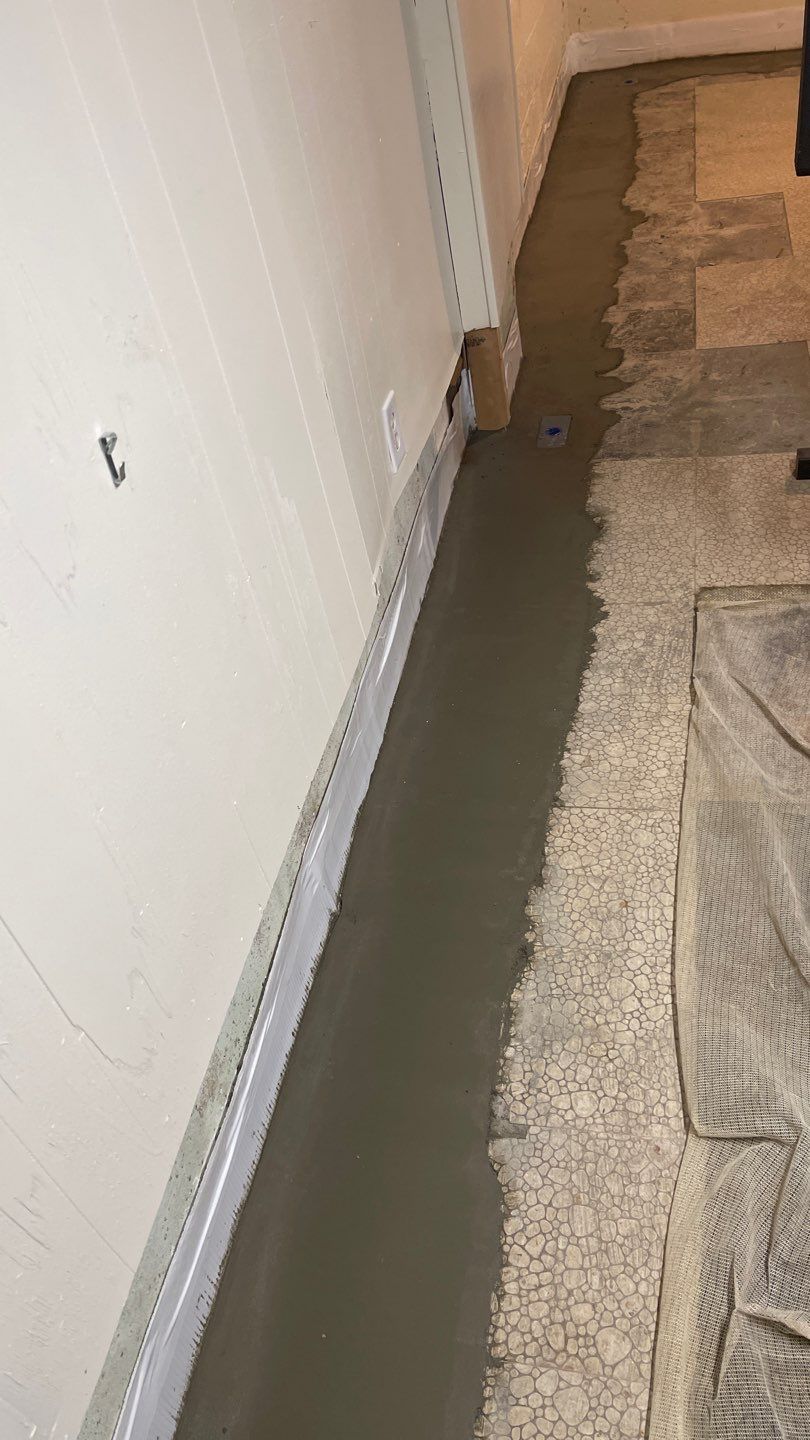 Interior Waterproofing Using GrateDrain™ Products by Toledo Basement Repair 