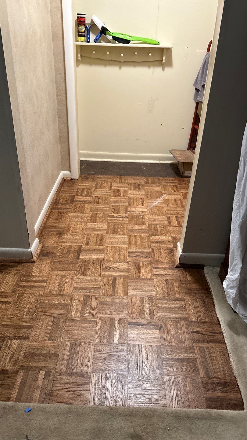 Parquet floor and stair treads by Footprints Floors of Nashville