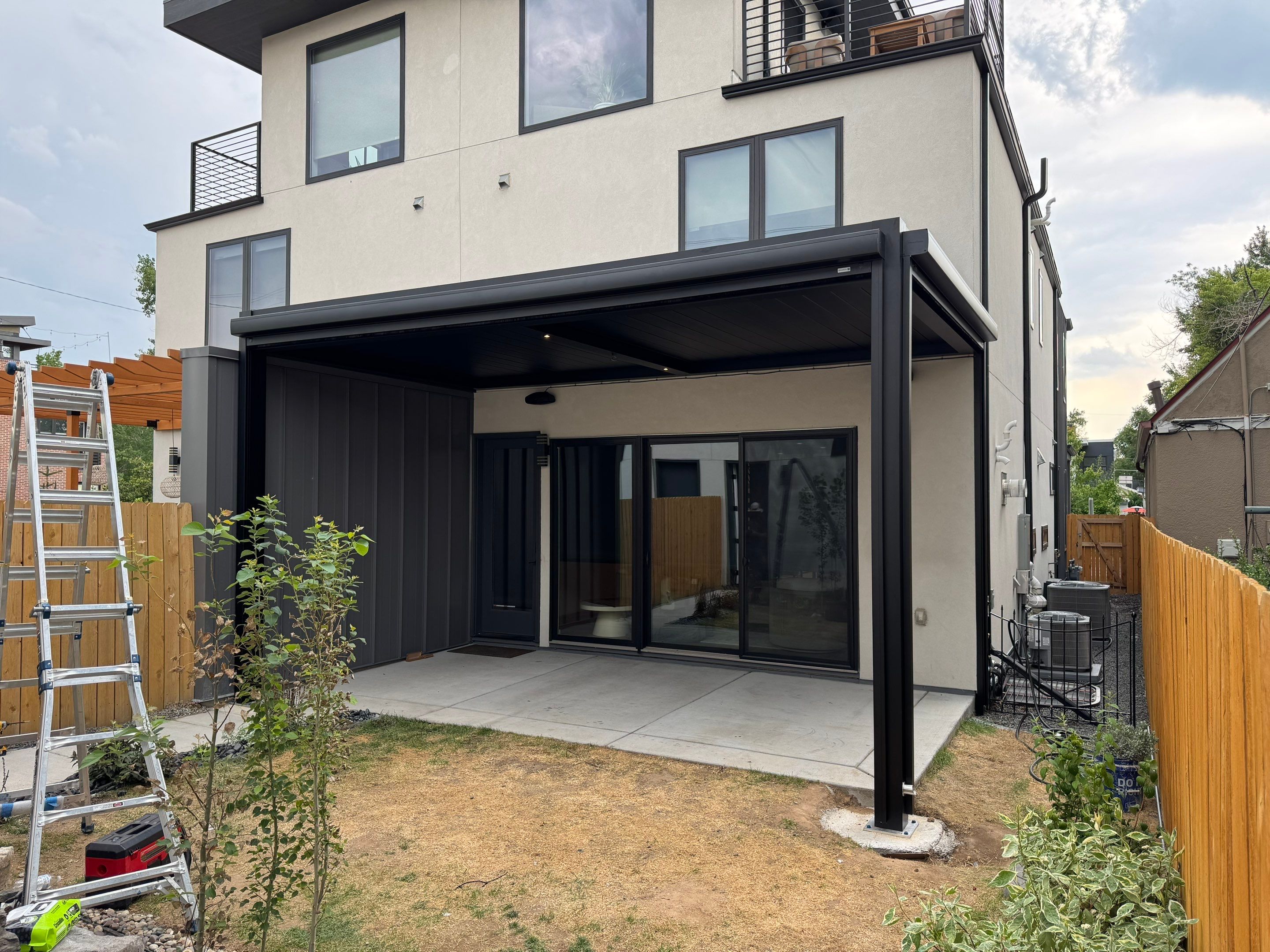 Aluminum Pergola using Azenco Outdoor and MagnaTrack Screens by Outdoor Solutions Colorado