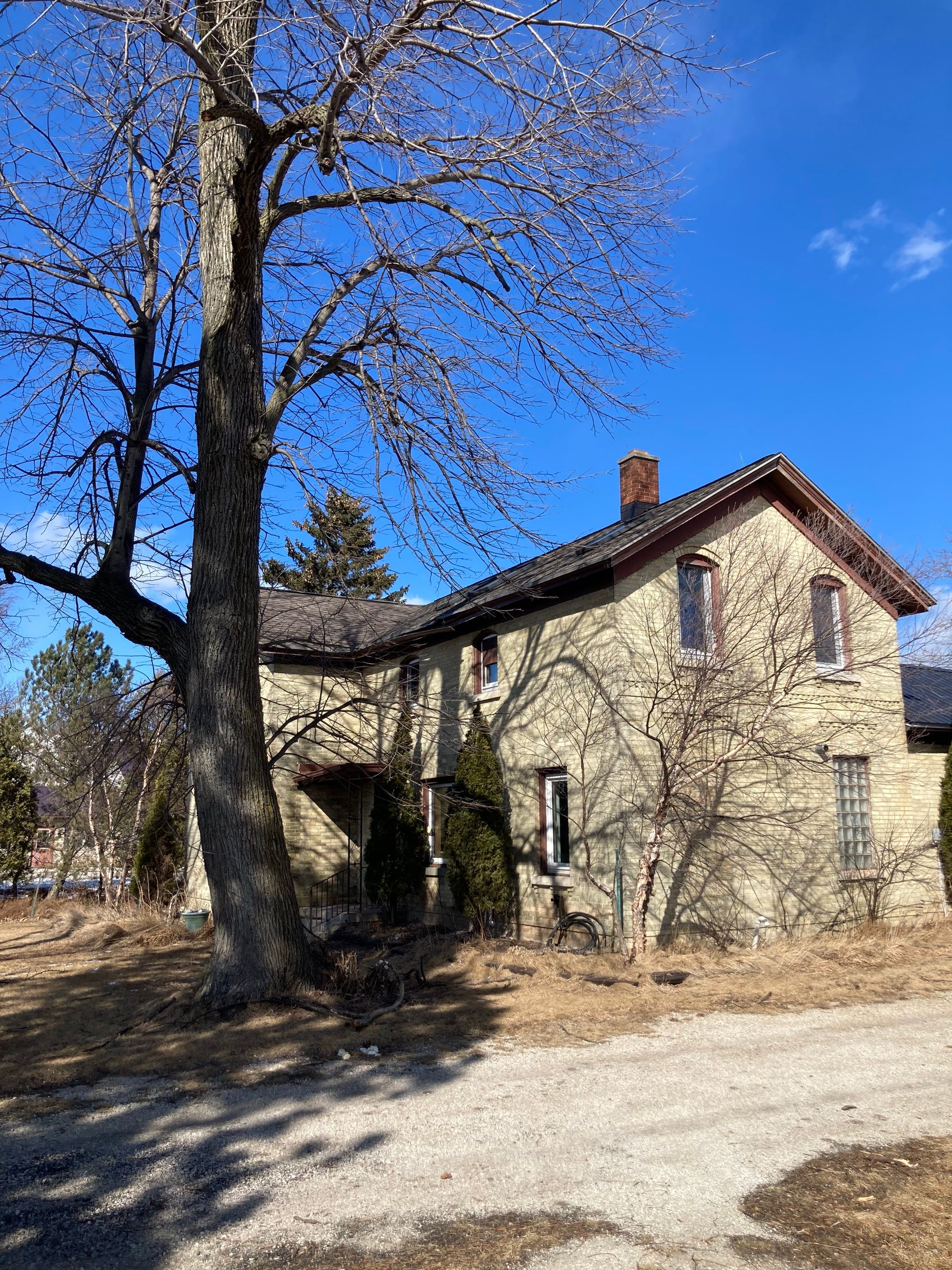  Metal Roof Installation on Residential Brick Home in Oostburg, WI by Gellings Roofing & Siding
