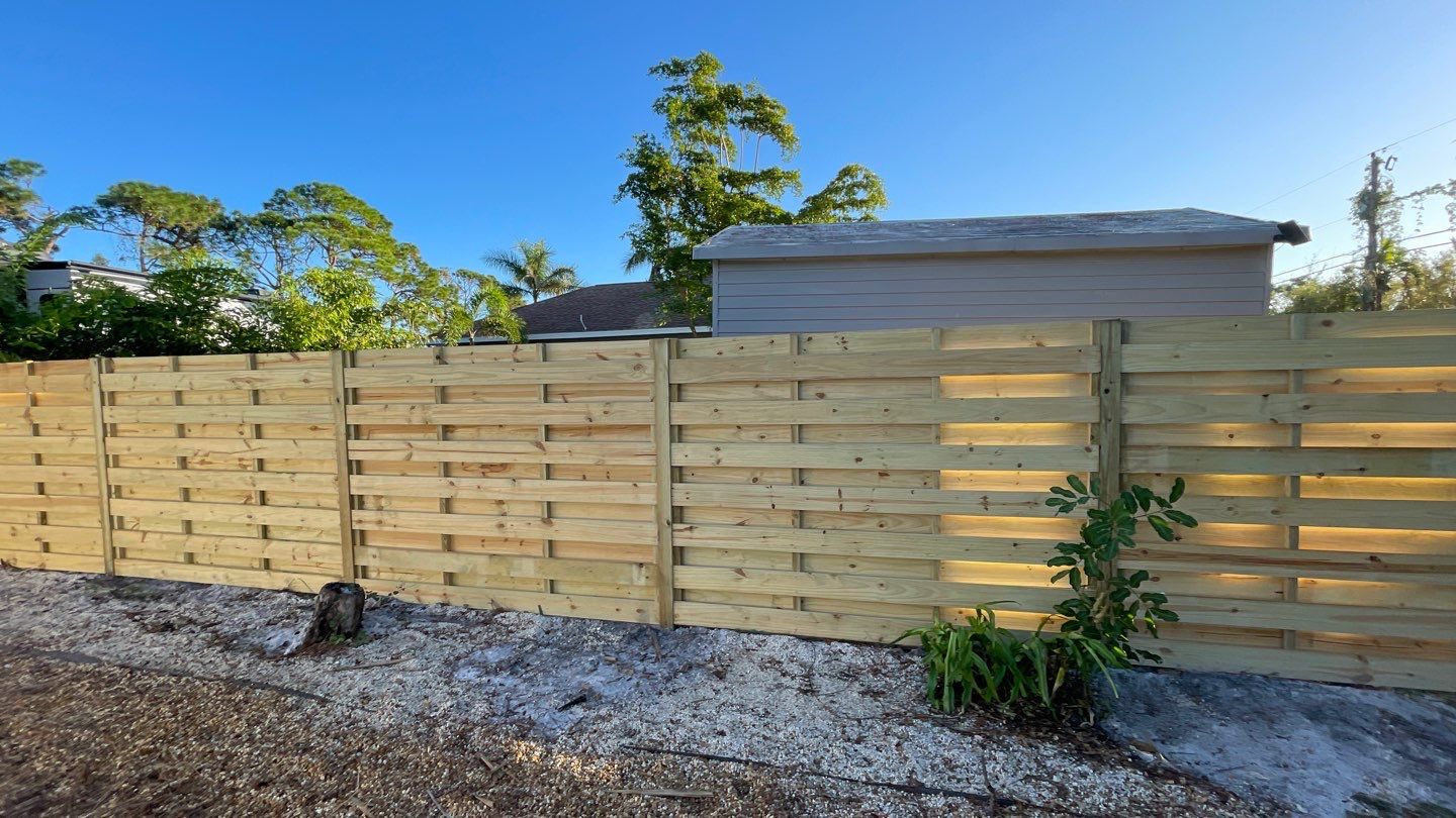 Wood Fence Installation using Horizontal Shadowbox Wood Privacy Fence by Asap fence and gates, LLC