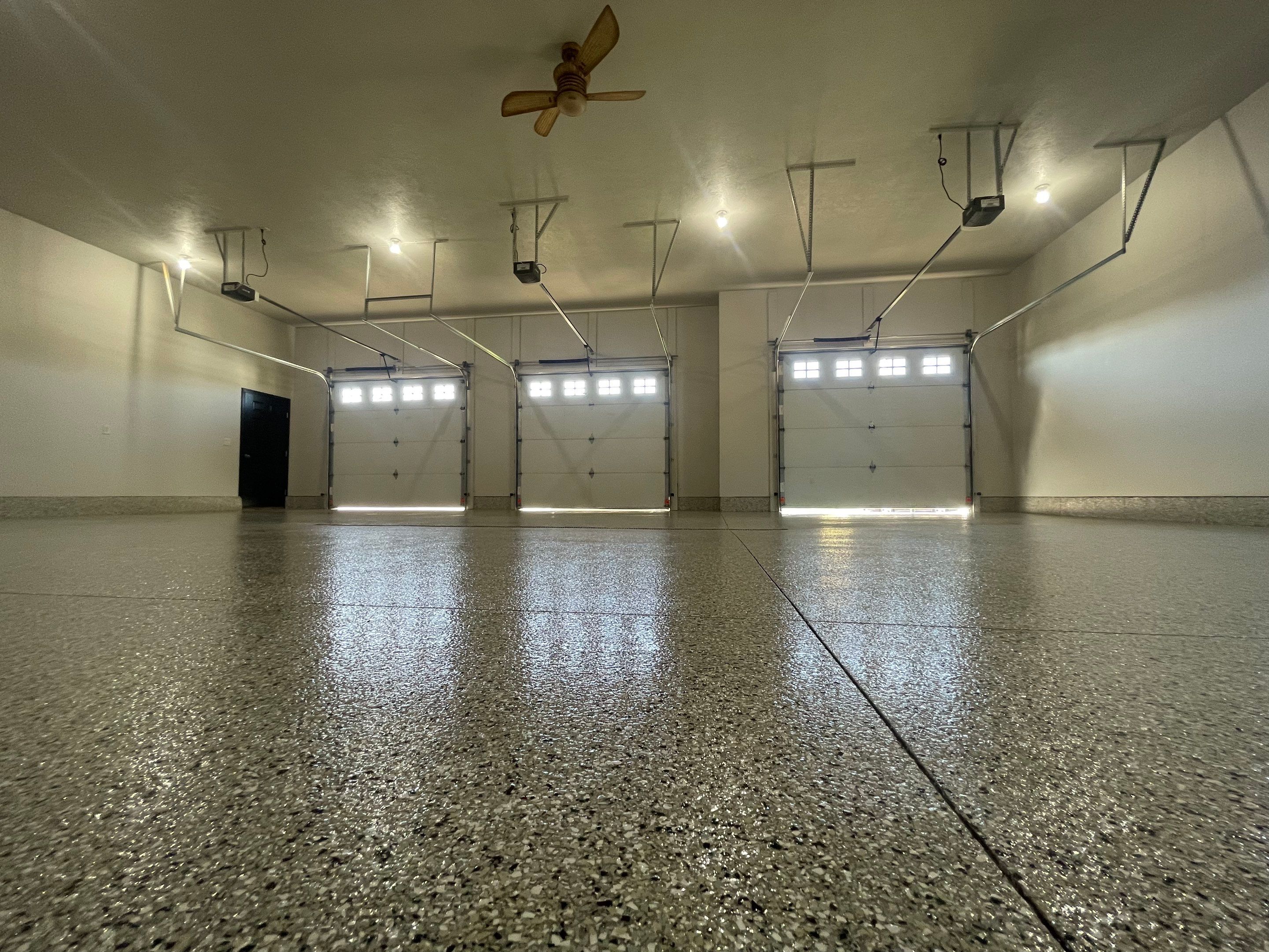 Multi-Car Garage Epoxy Floor Coating in Beresford by Select Painting, Coatings & Garage Cabinets