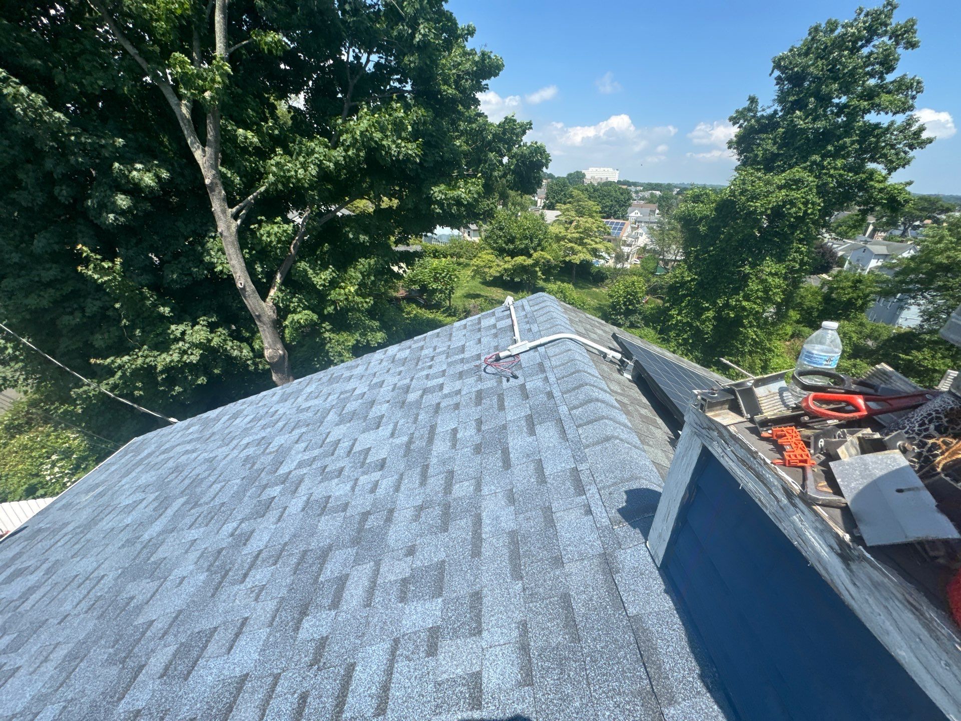 Harbor Blue Shingles by Reimagine Roofing