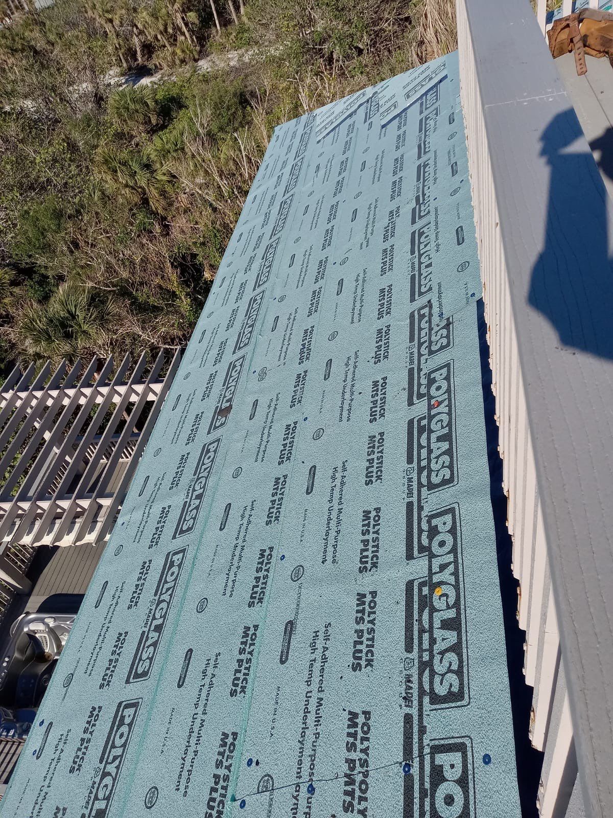 Residential Roofing Installation using Gulf Coast Metals Gulf Seam Panels by Four Peaks Roofing