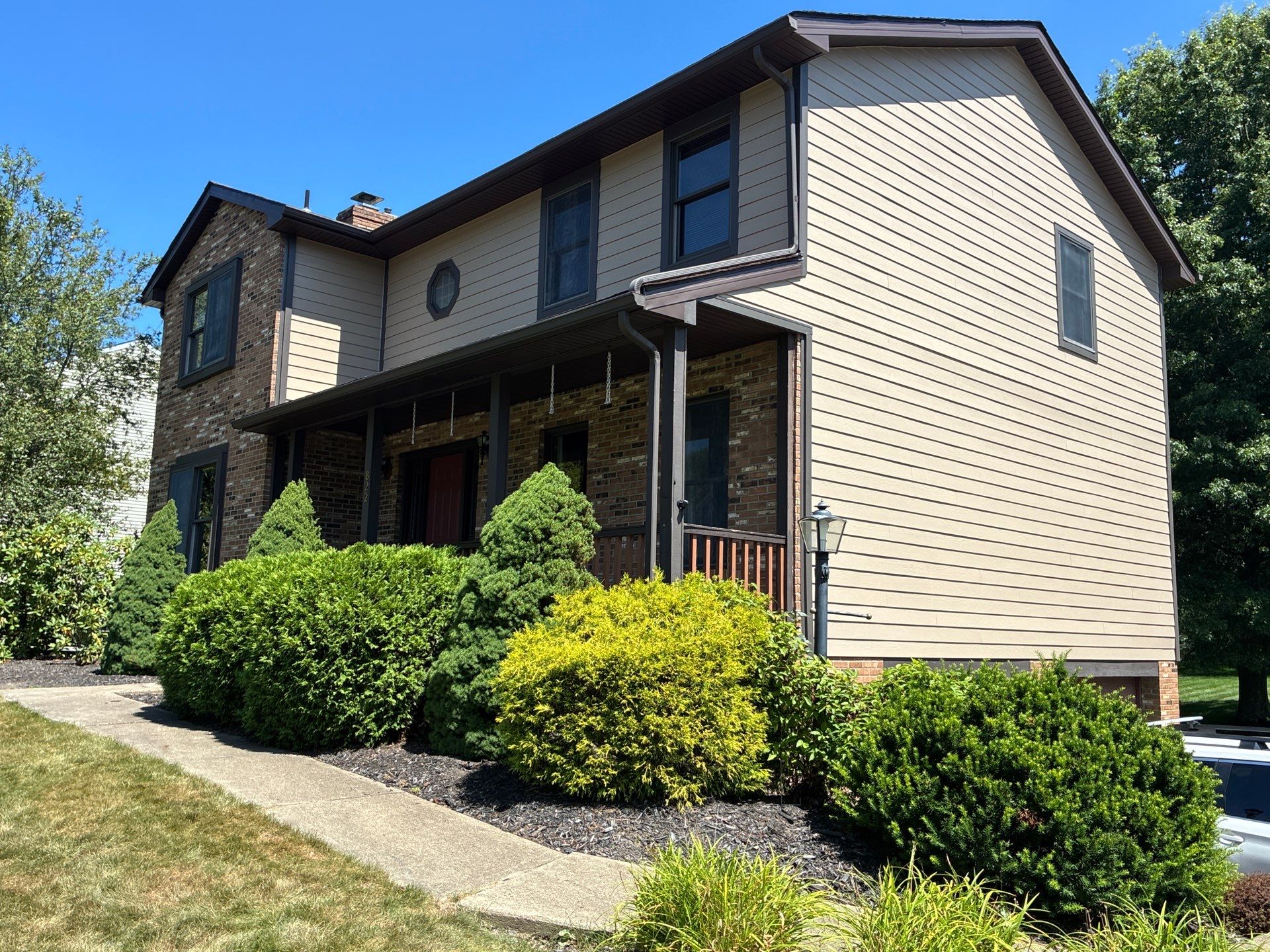 Full House James Hardie Lap Siding and Trim Renovation With Modern Dark Trim In Wexford / Mars PA by Ideal Siding Pittsburgh