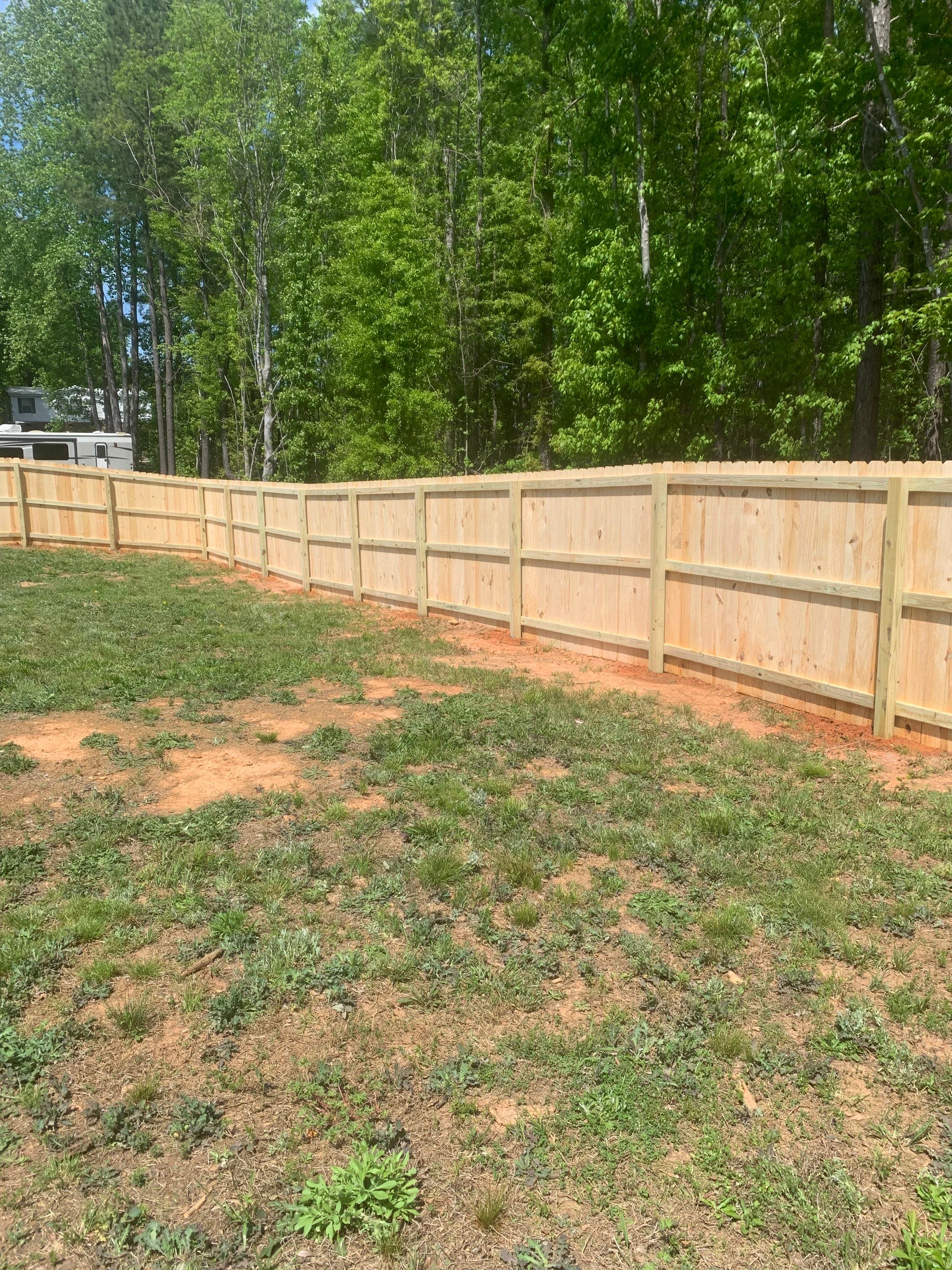 Stockade Wood Project in Roanoke Rapids by Superior Fence and Rail