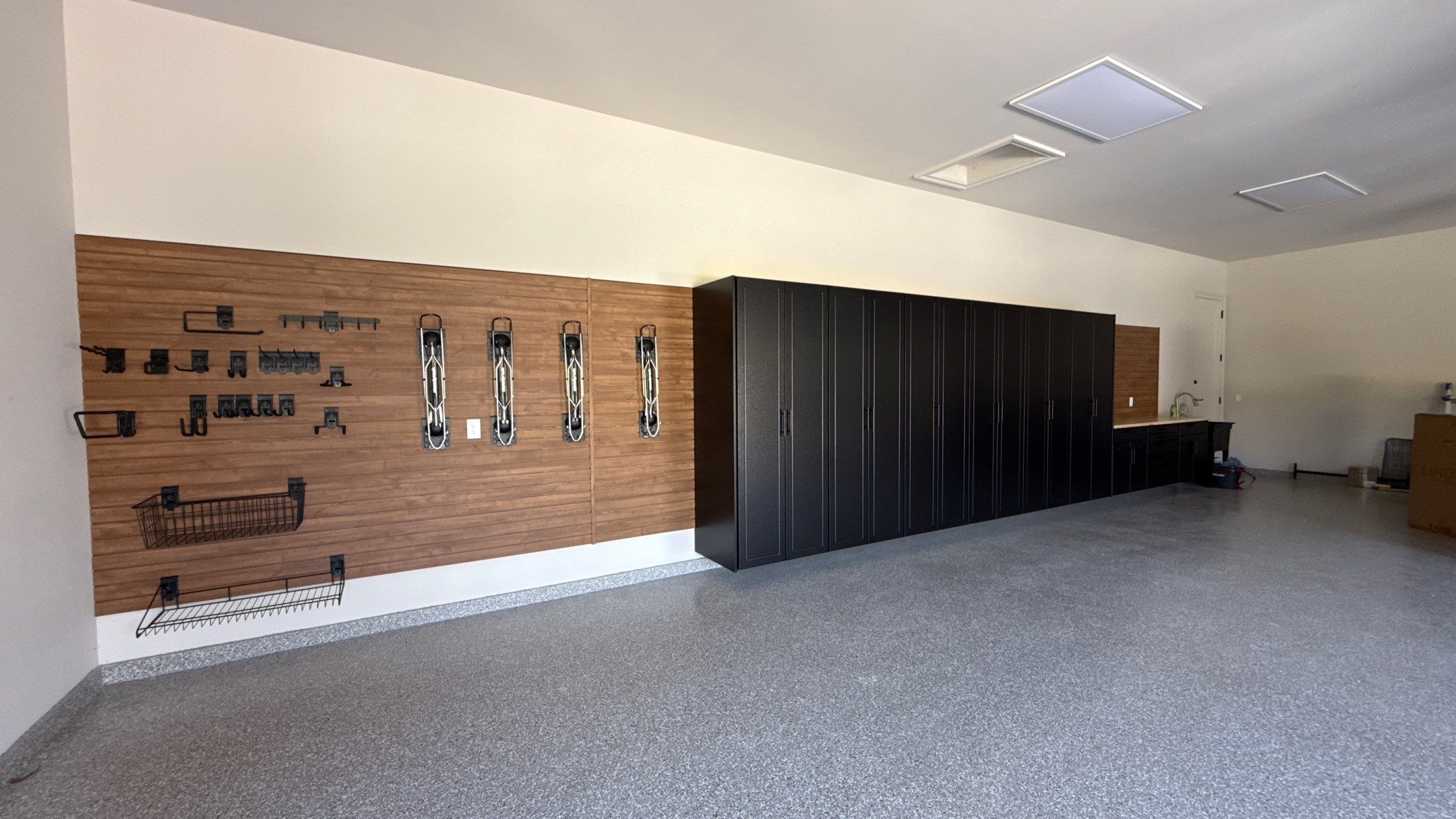 Check Out this beautiful Storage Addition With Western Cedar Slatwall  by Banner Garage