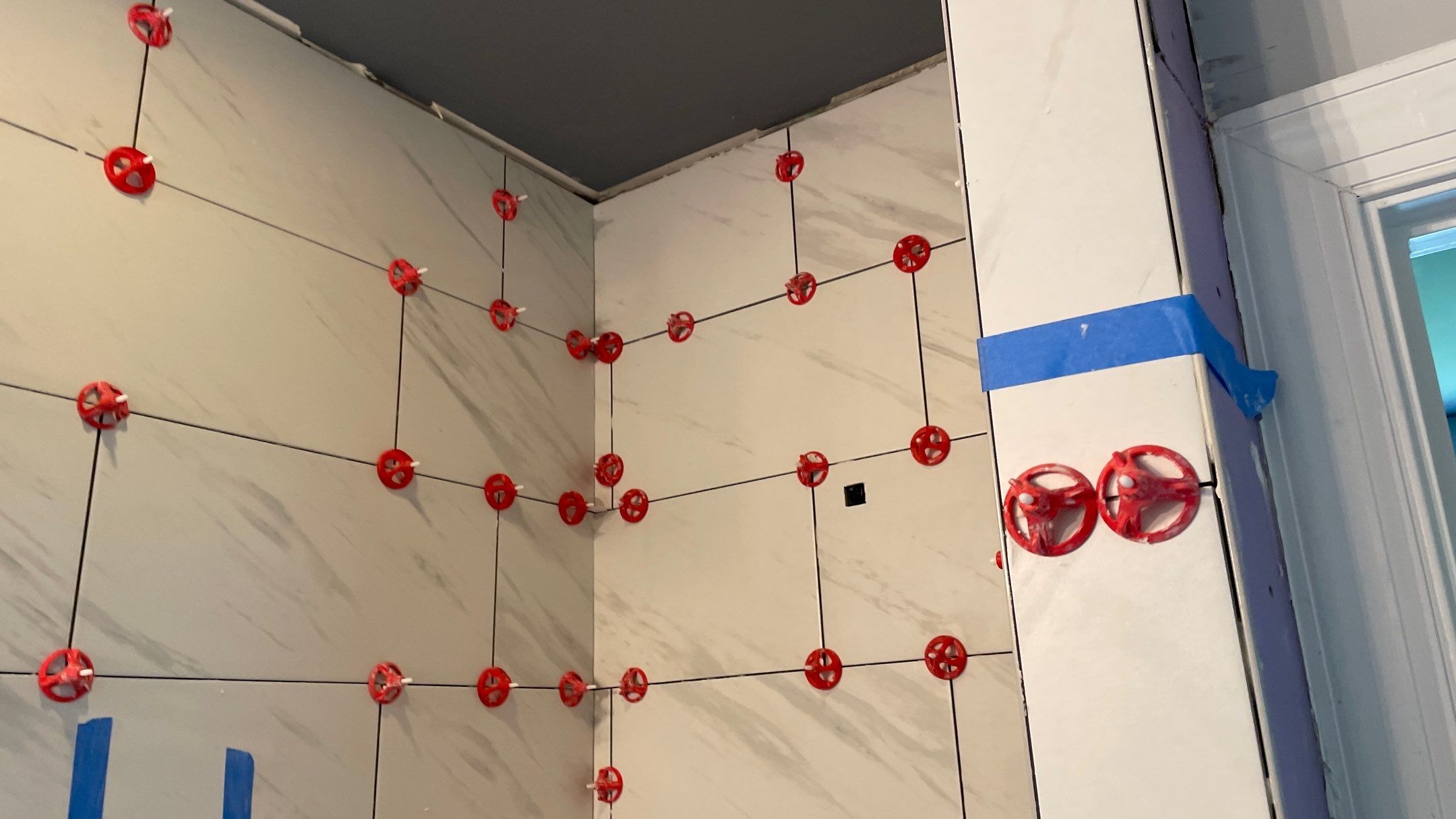 Bright Bathroom Remodel with Wall Removal, Stand Alone Tub and New Vanity by Footprints Floors of Coastal Carolina