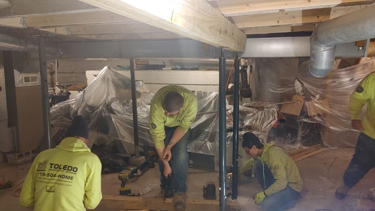 Structural Wood Reinforcement using Structural Wood and Steel Reinforcements (Main Floor Joist) by Toledo Basement Repair