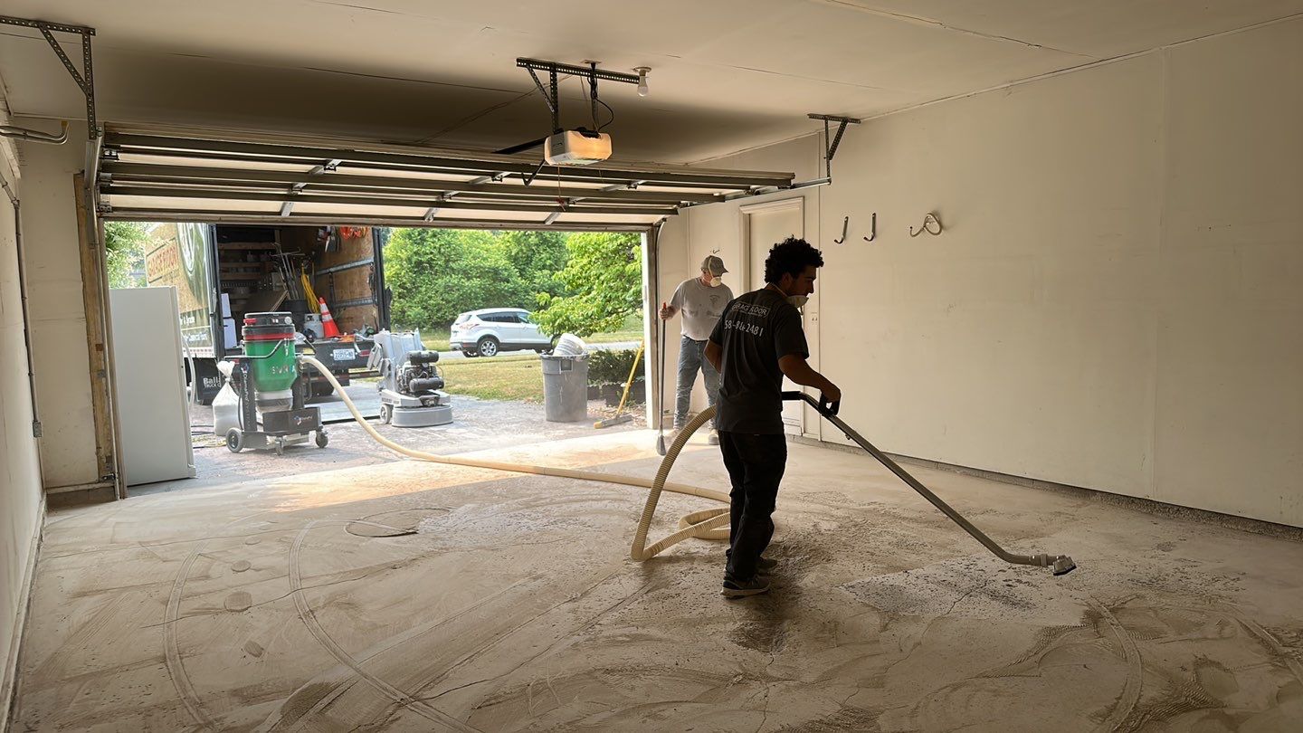 Silverado garage floor and patio coating  by NG Masonry & Construction LLC