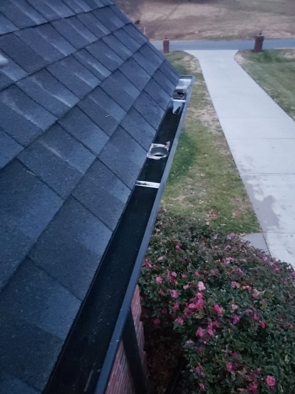 Gutter Cleaning using water by Power Wash Masters LLC