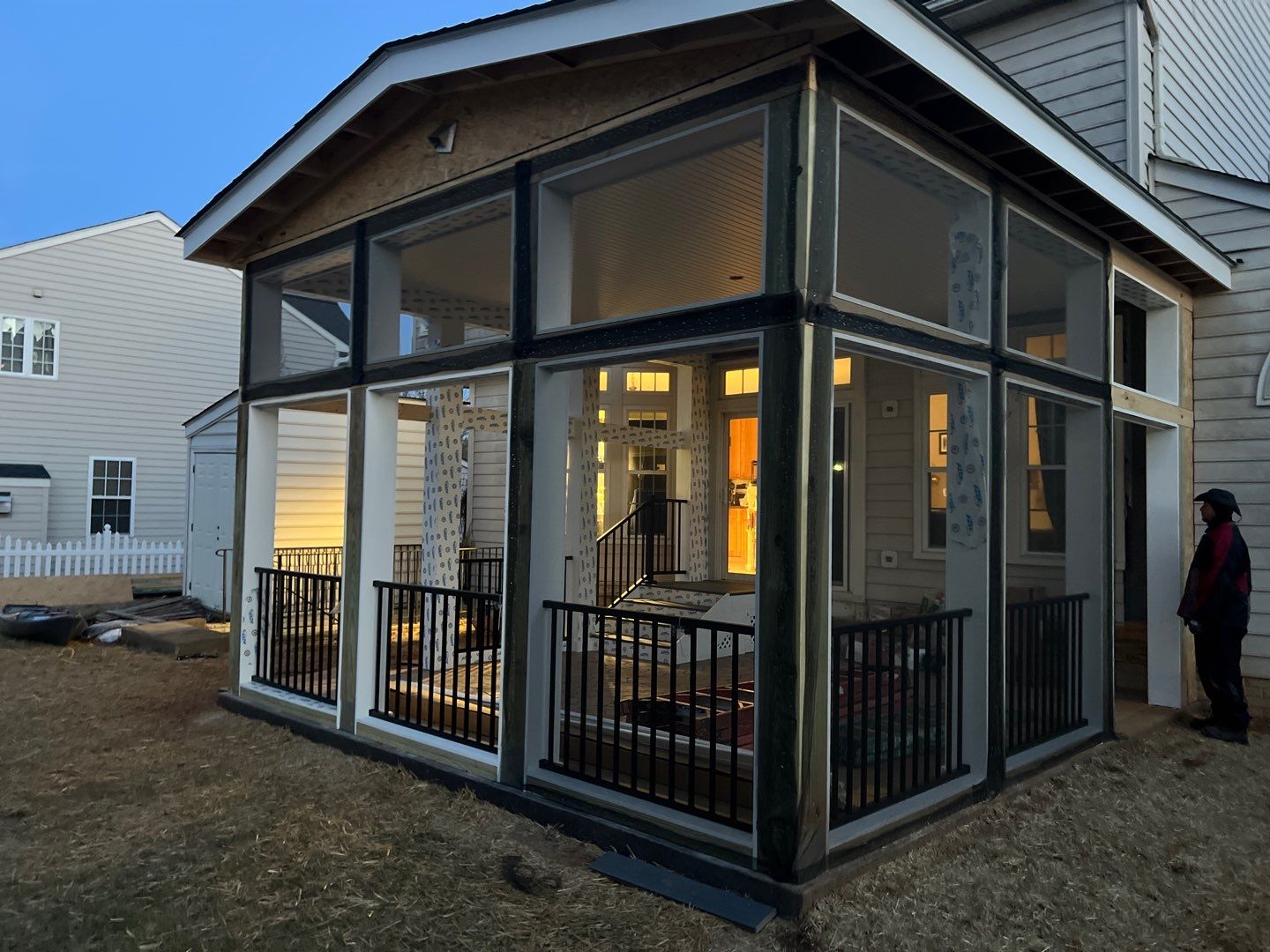 Custom Screened-In Porch with Stamped Concrete Patio in Warrenton by Jakari Restoration & Construction LLC