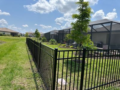 Aluminum Fence Installation using Black 3 Rail Aluminum Fence