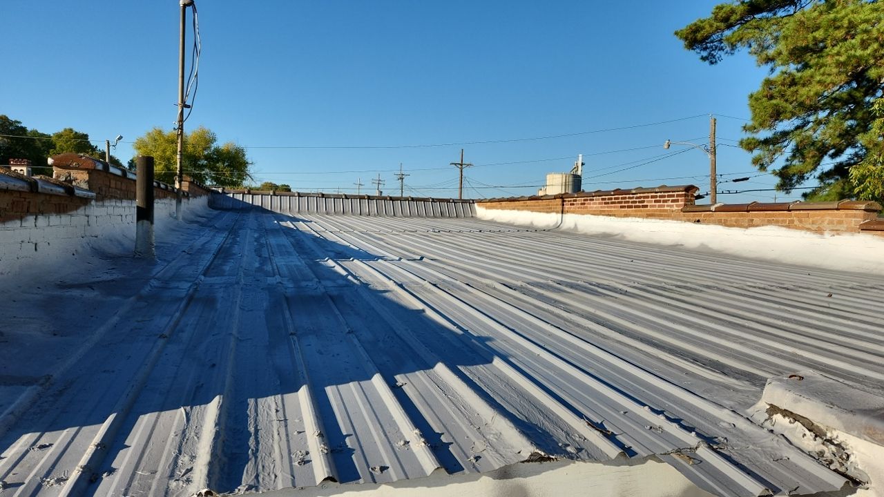 Commercial Roofing Installation using Aldocoat Coatings by Hostetler Roofing
