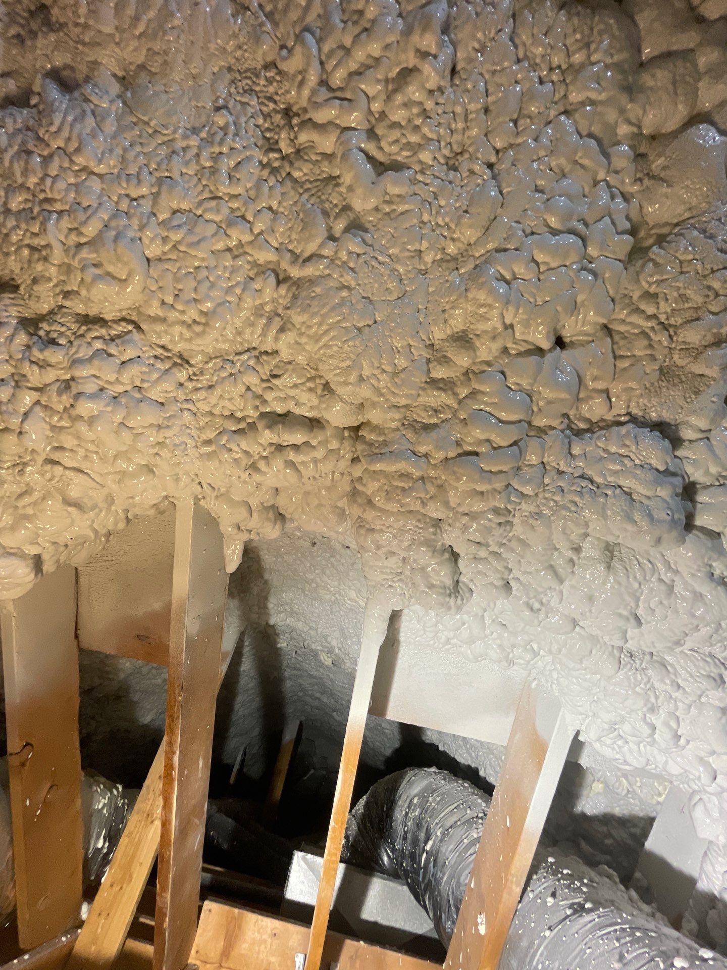 Attic Insulation using open cell spray foam by NYS Foam & Energy