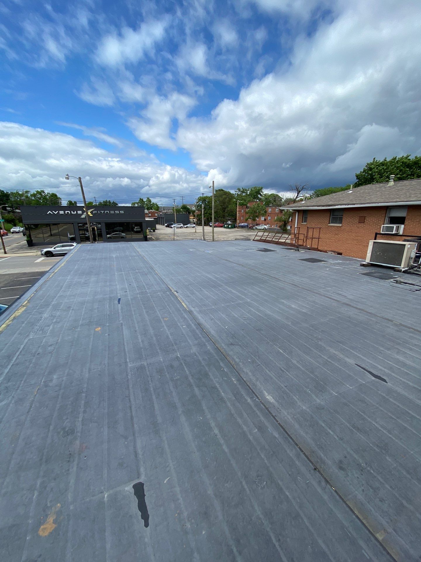 Commercial Roofing Installation using 60 mil rubber roof  by Nitro Roofing and Construction