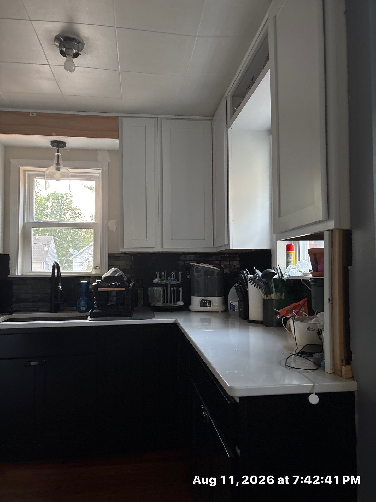 Two-Tone Kitchen Remodel with Black Subway Tile in Lincoln by CompanyCam Sales Demo