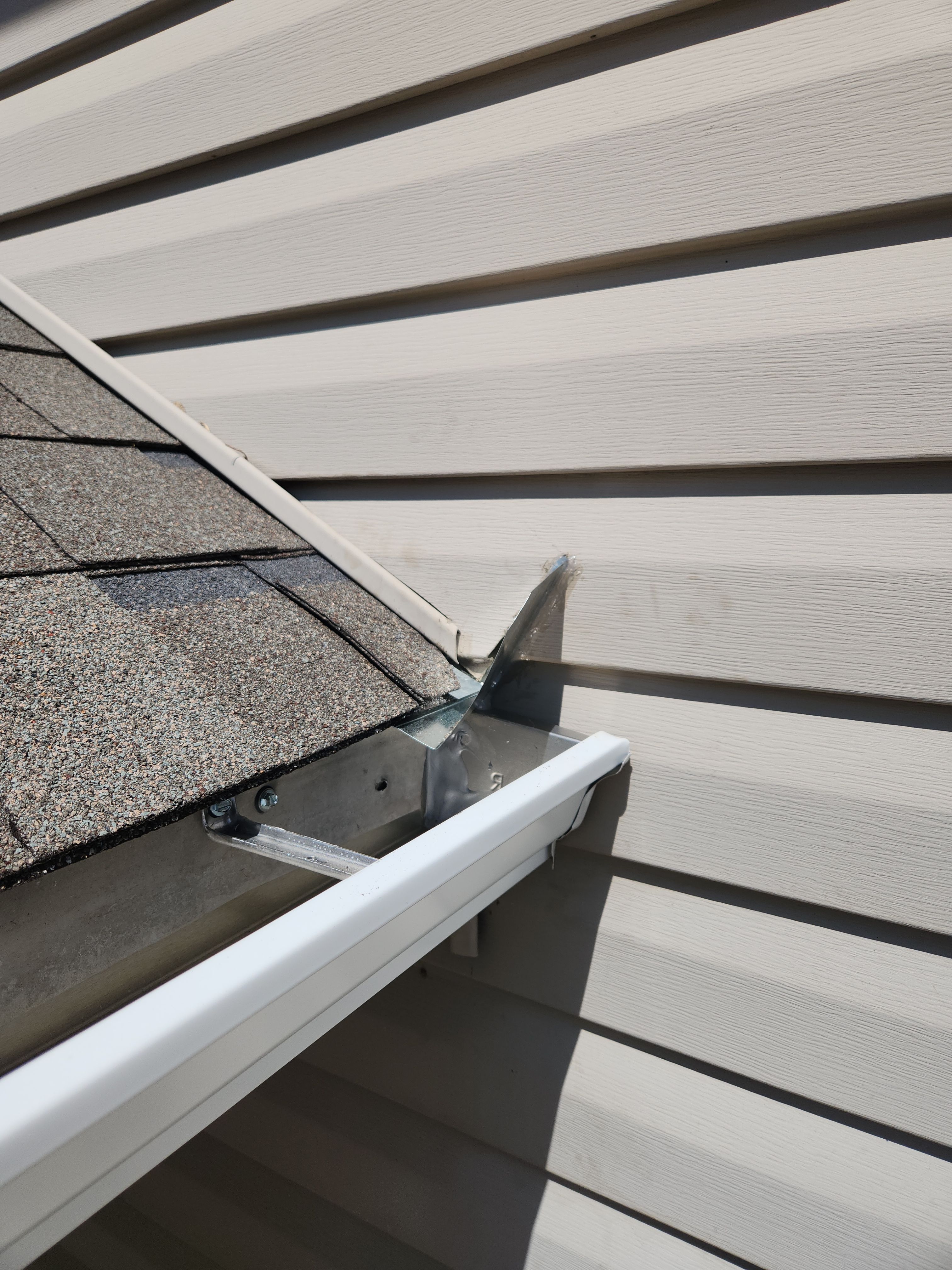 Seamless Gutter Installation in Big Lake MN | 5” White Gutters & LeafBlaster Pro Gutter Guards by Next Level Seamless Gutters / Exteriors Inc.