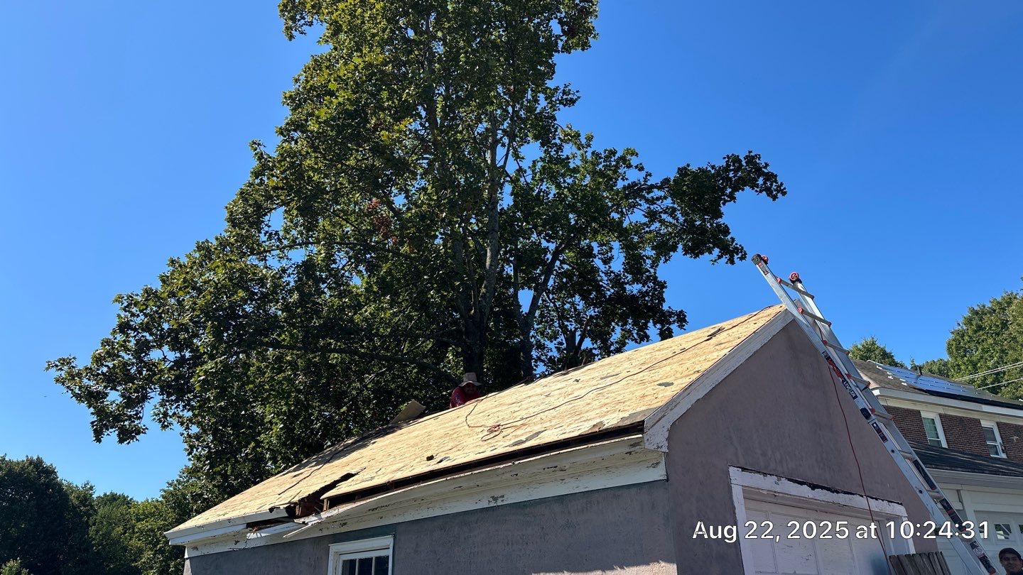 Garage Roof Replacement & Trim Repair by Mighty Dog Roofing of Greater Middlesex County