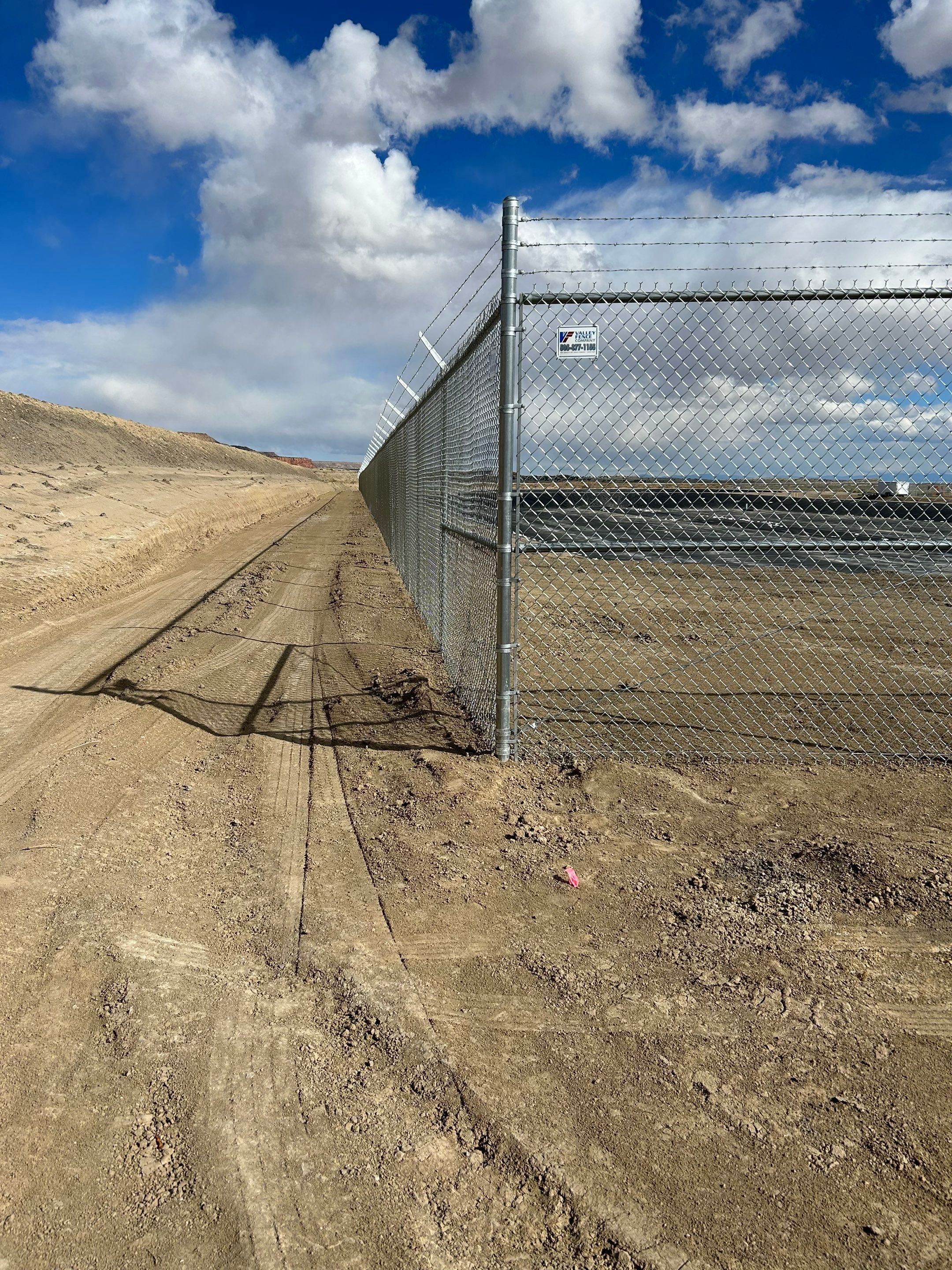 Commercial  using 8'+1' 9ga chain link by Valley Fence Company
