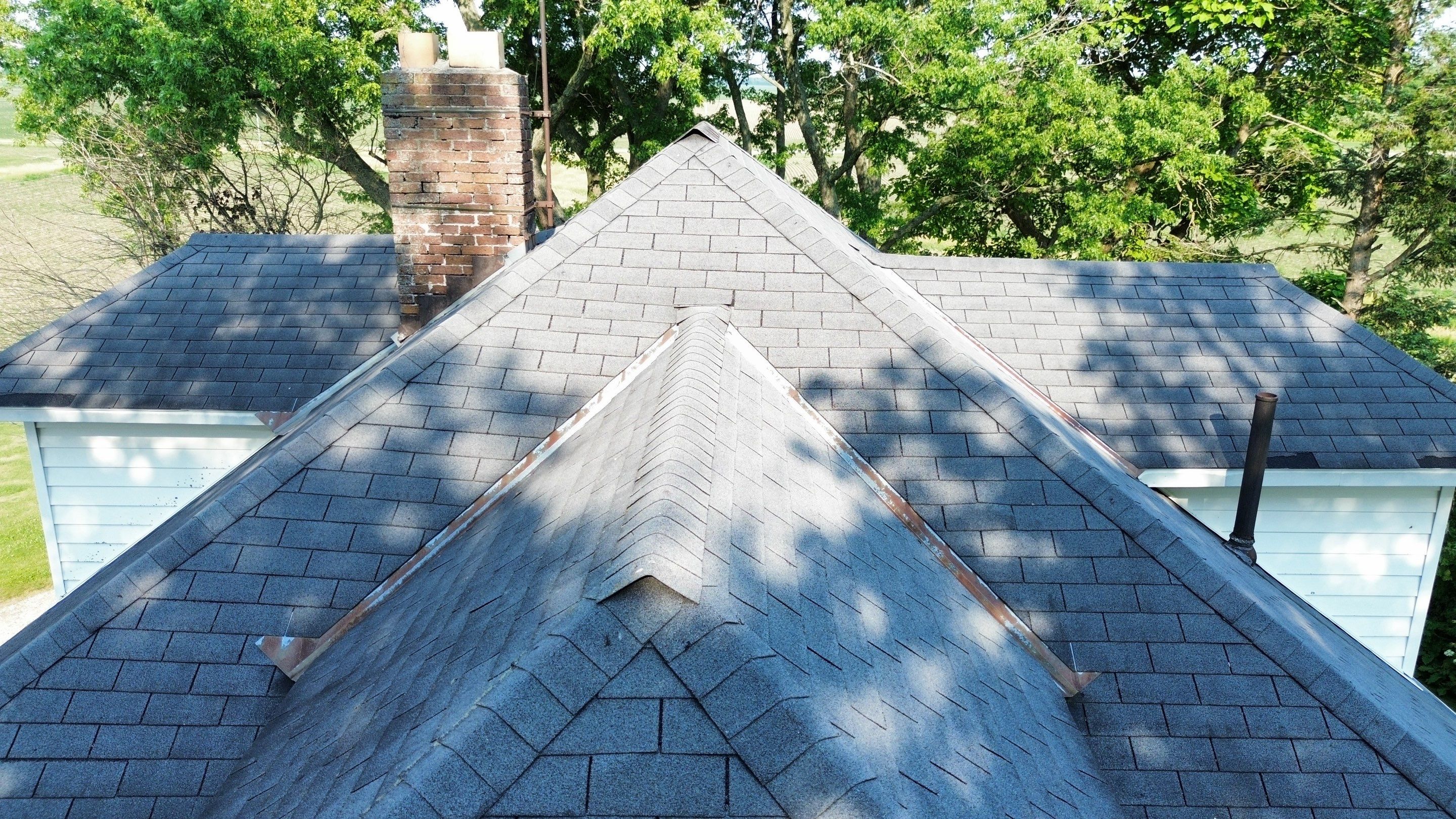 Residential Roofing Installation using Performance Panel Metal - Copper Metallic by RoofX 