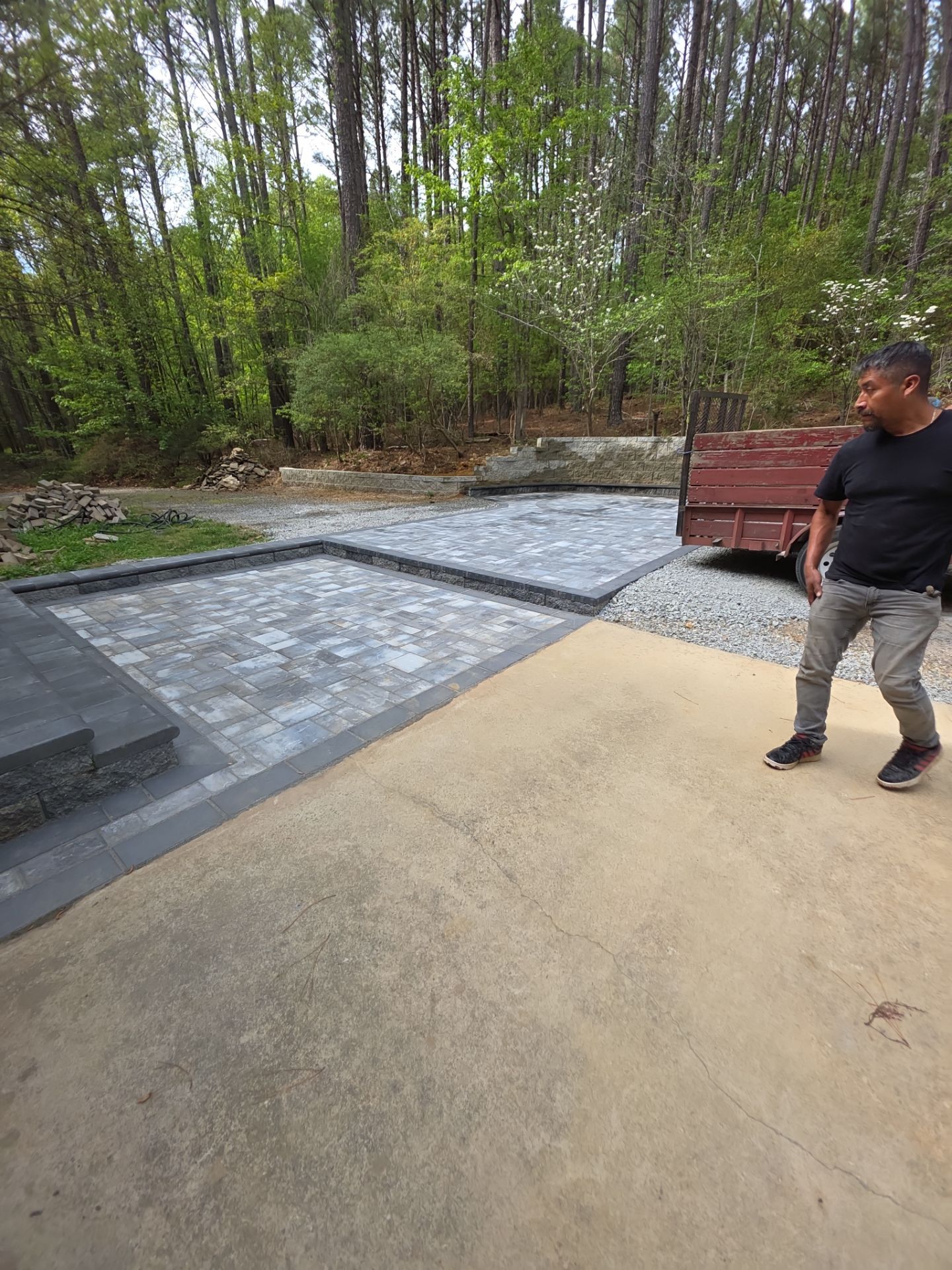 Pittsboro Outdoor Living Transformation – Retaining Wall, Paver Patio & Elevated Deck by Elite Remodeling and Design LLC