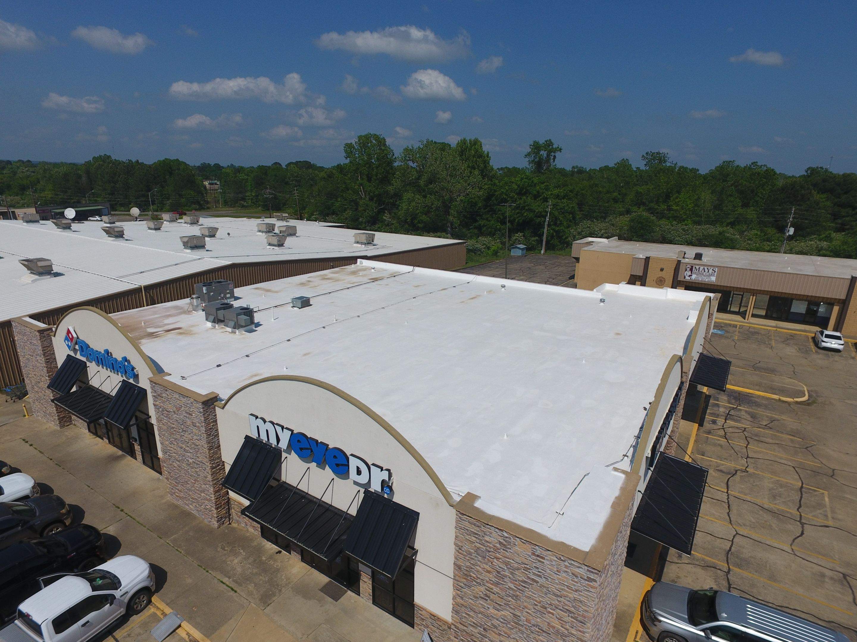 Commercial Roofing Installation using Aldocoat Coatings by Hostetler Roofing