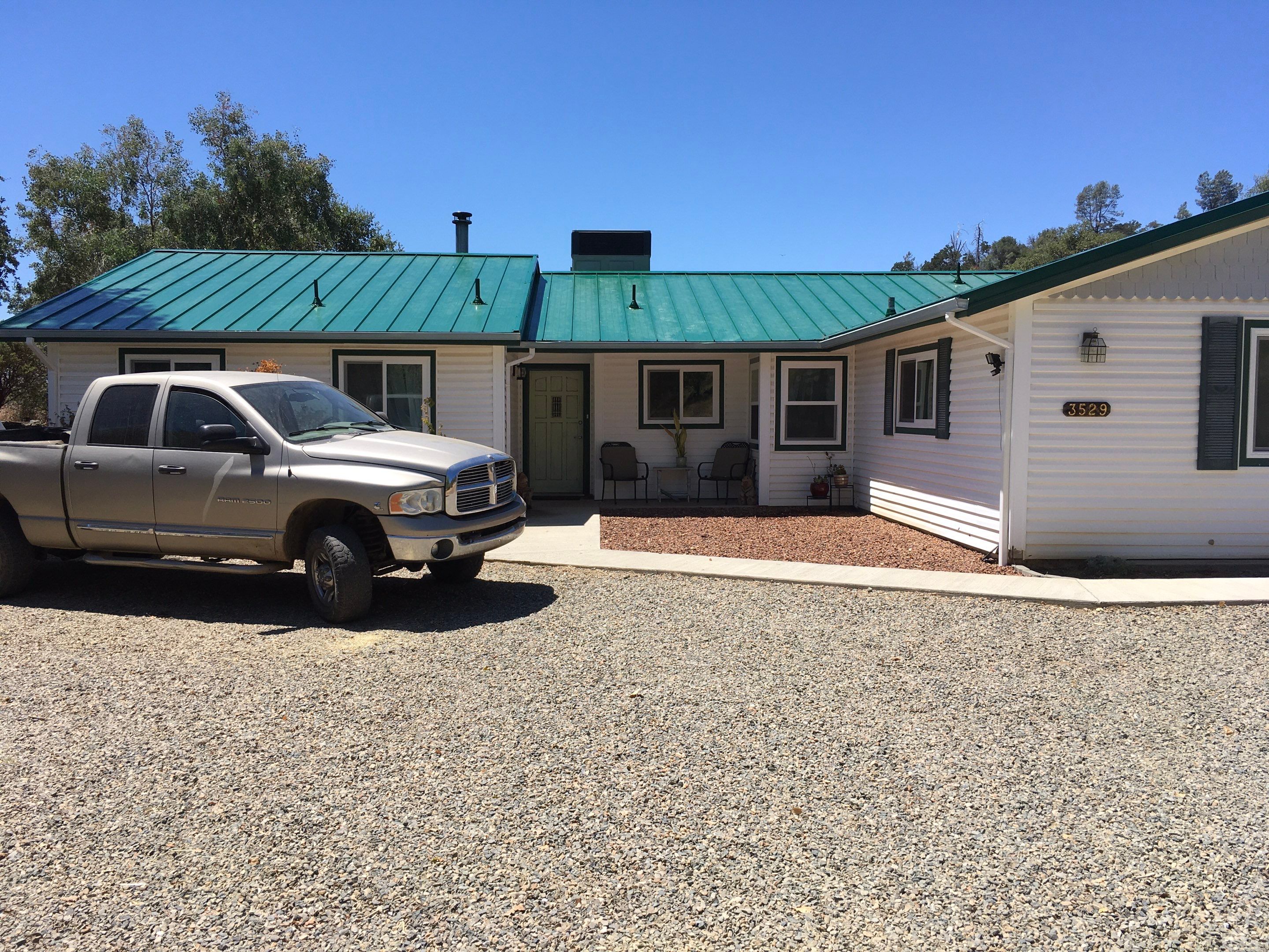 Metal roofing installation using Standing seam metal roofing system by Straight Edge Roofing Inc