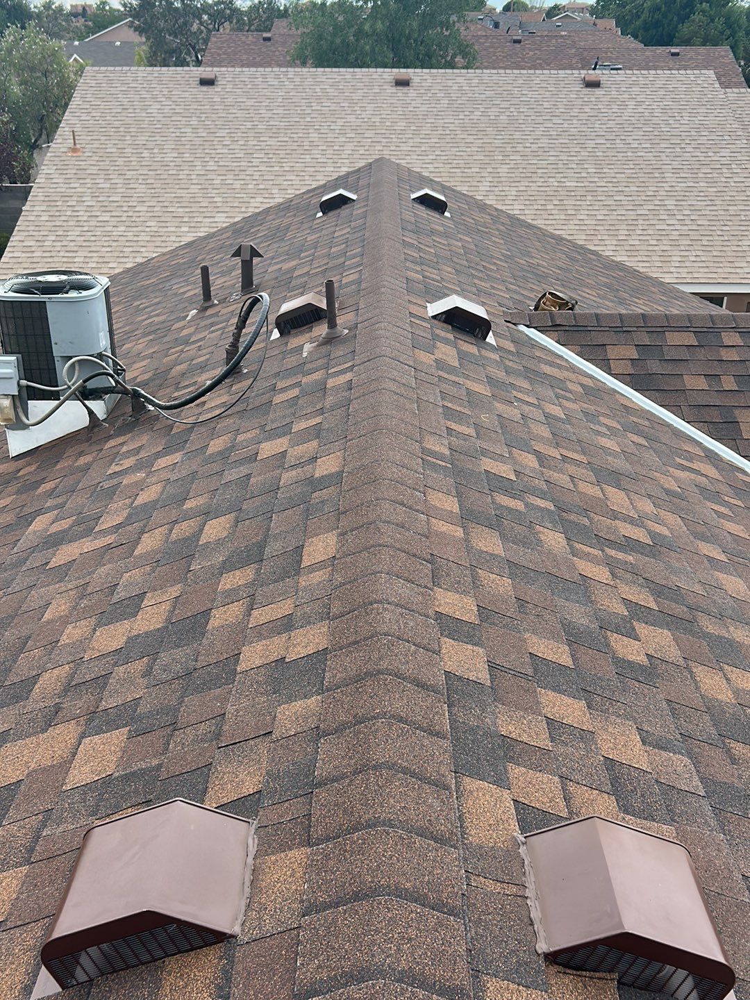 Brownwood Shingles by Reimagine Roofing