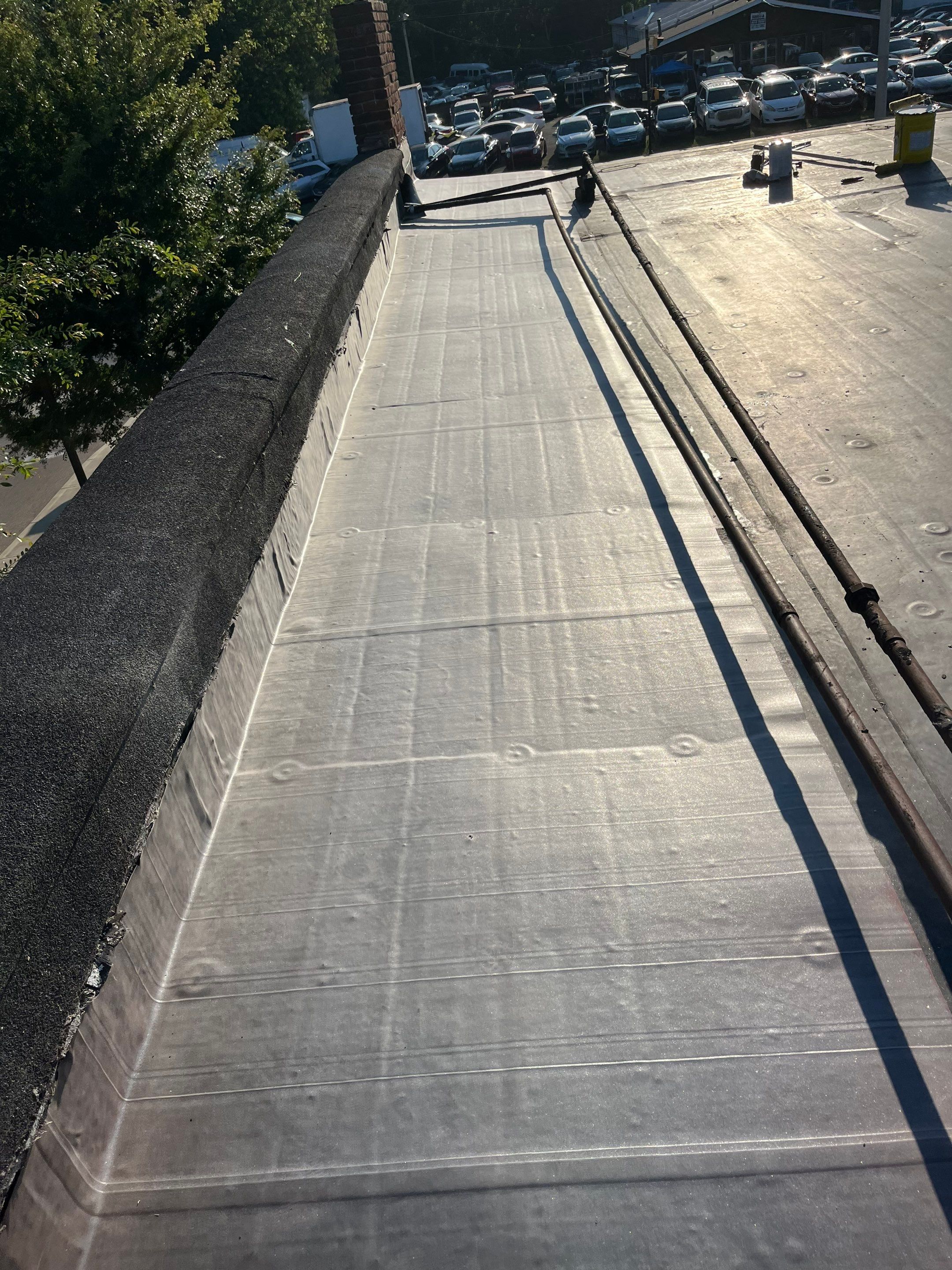 Commercial Roofing Repair using 60 mil rubber roof  by Nitro Roofing and Construction