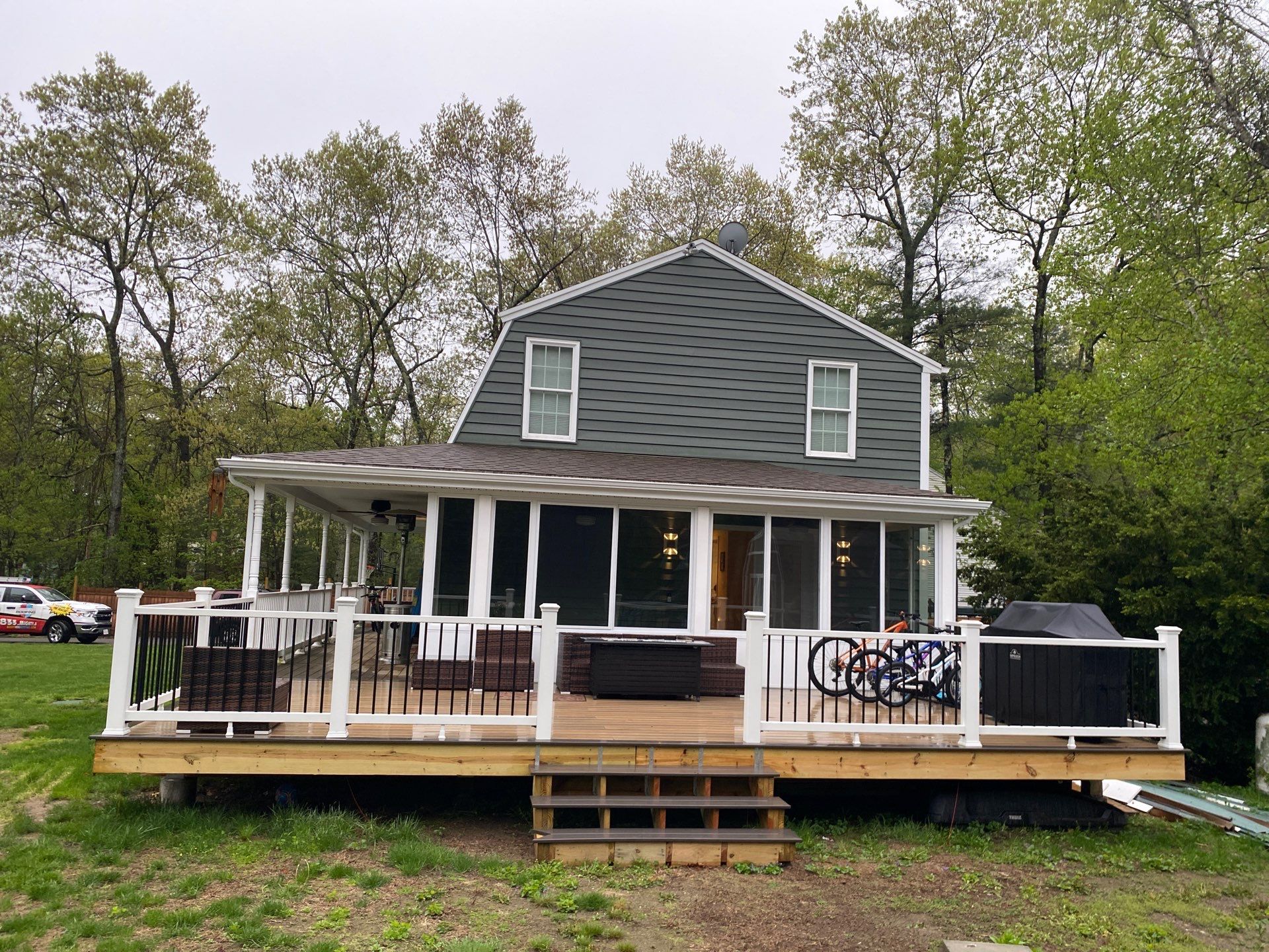 Full Roof Replacement & Farmers Porch Restoration – Asphalt + Standing Seam Metal by Mighty Dog Roofing of Greater Middlesex County