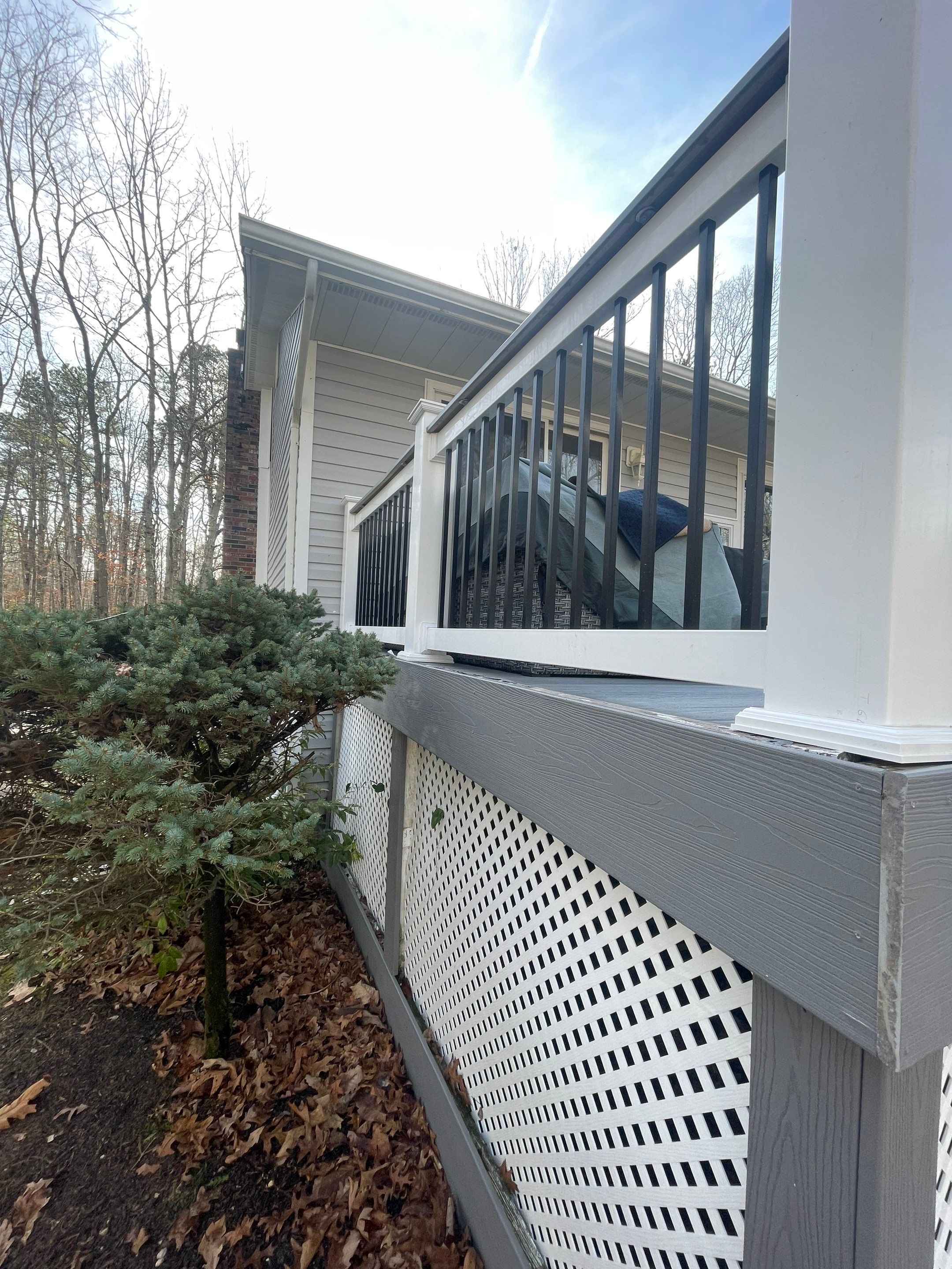 Pressure treated wood deck cleaned by SJ Exterior