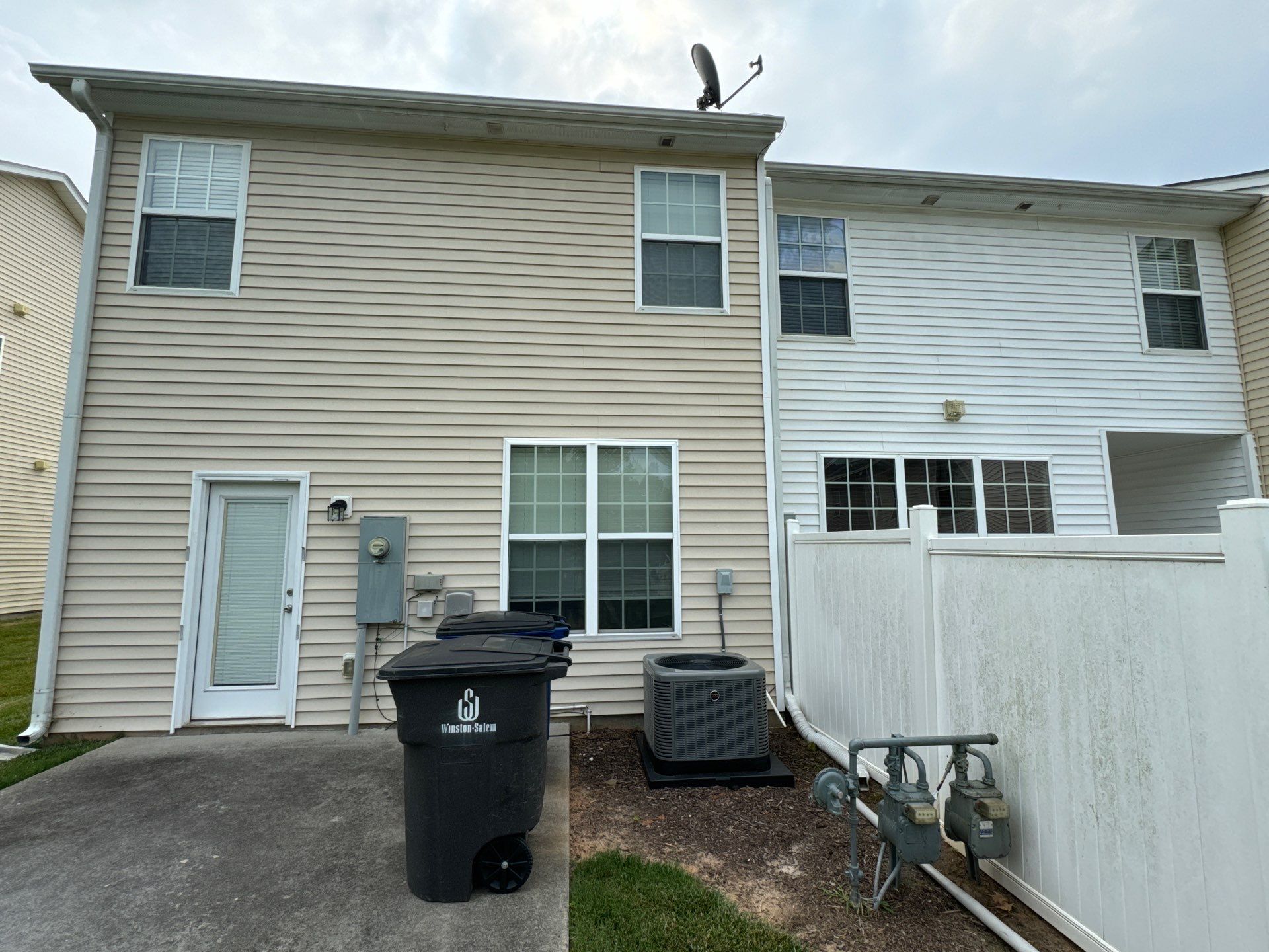 exterior house siding and vinyl fence cleaning by pressure washing