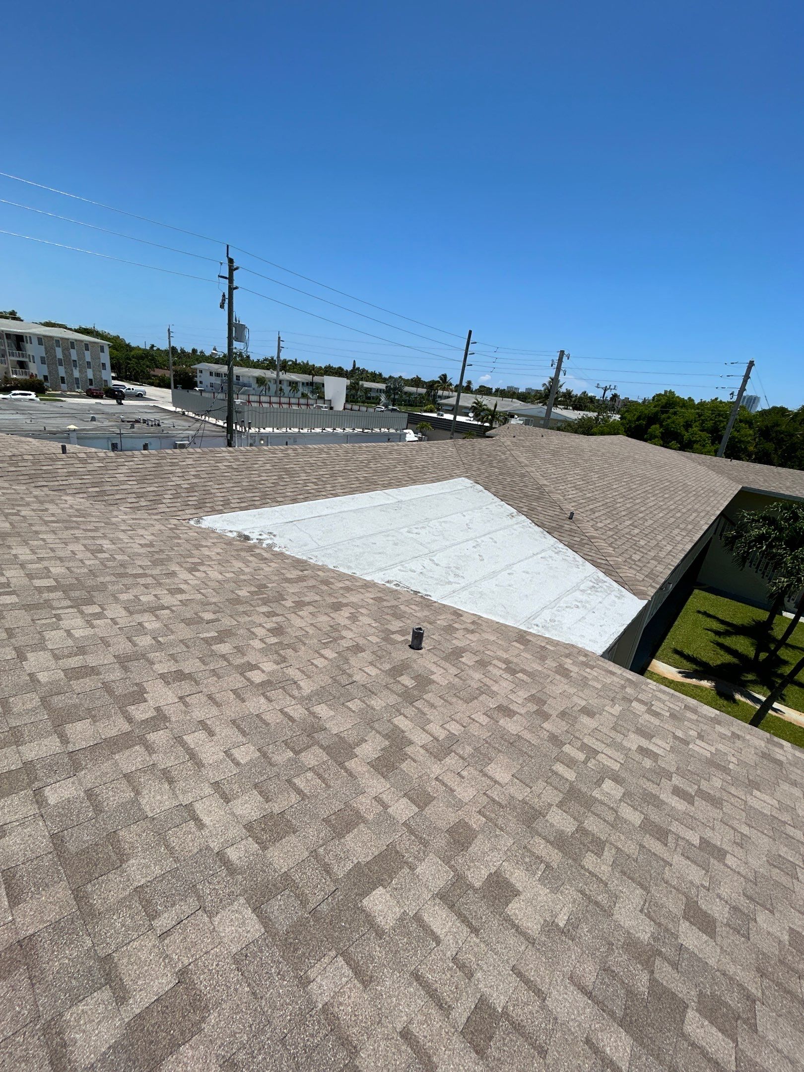 Commercial Roofing Installation using CERTAINTEED LANDMARK AR (SUNRISE CEDAR) by Earl W. Johnston Roofing 