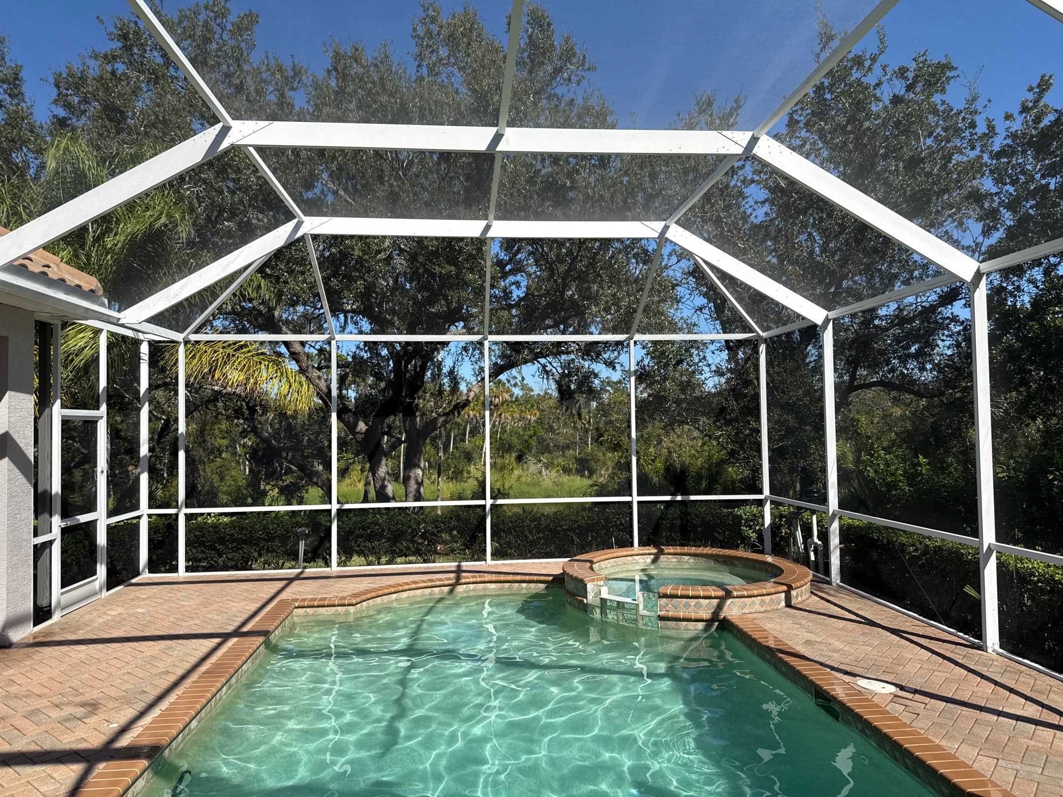 House Wash, Pool Deck & Screen Enclosure Cleaning | University Park, Sarasota FL by Sunshine AquaWash