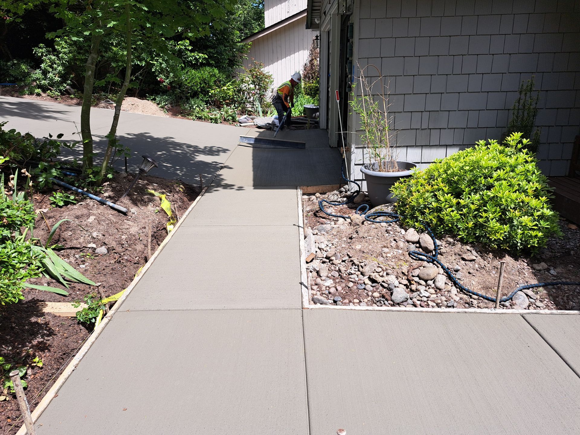 Kate | Concrete Driveway & Walkway by Jireh Asphalt & Concrete Inc 