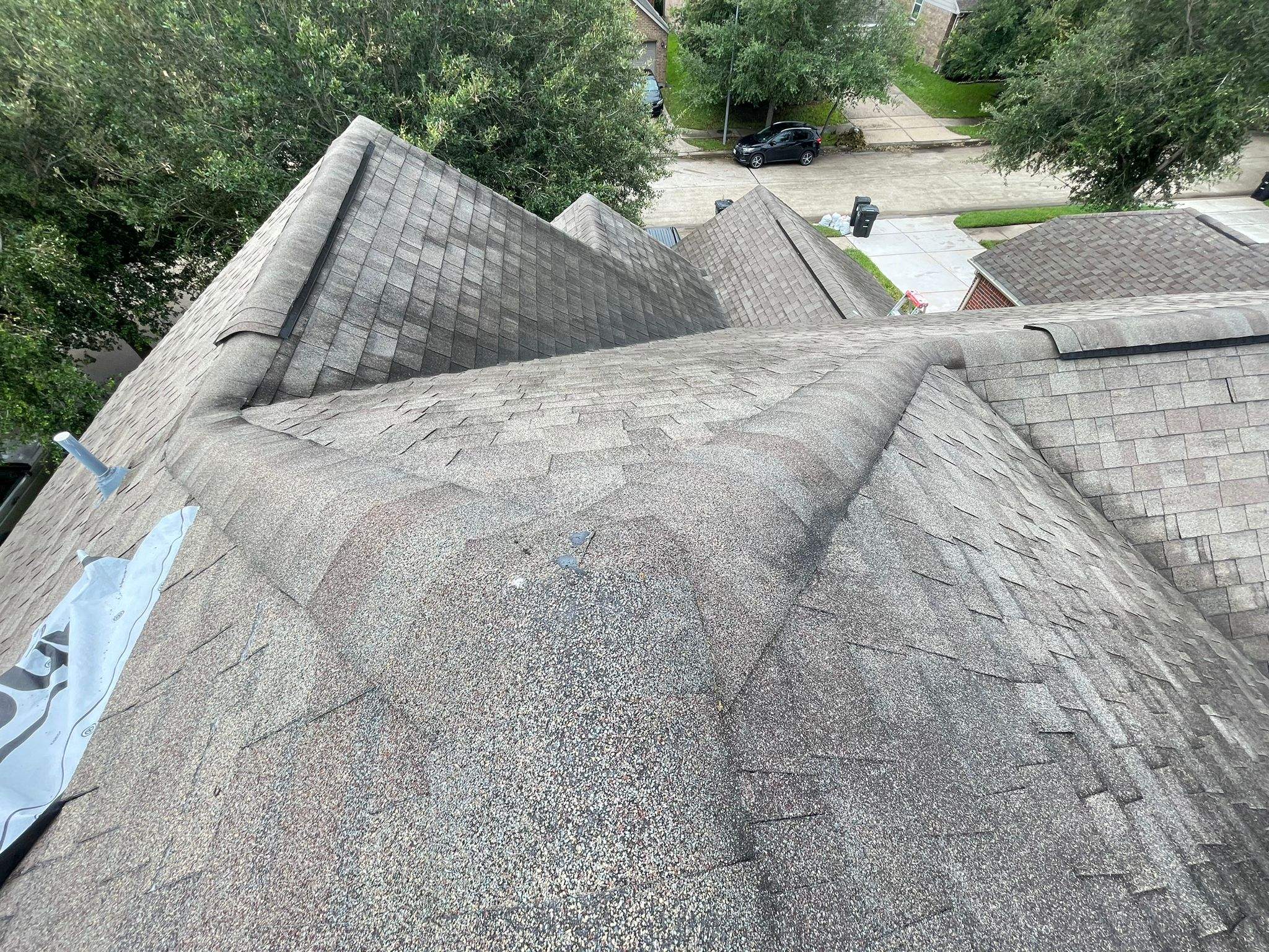 Residential Roofing Installation using Atlas Pinnacle® Pristine Shingles Weatherwood Color by CAP Roofing and Construction LLC