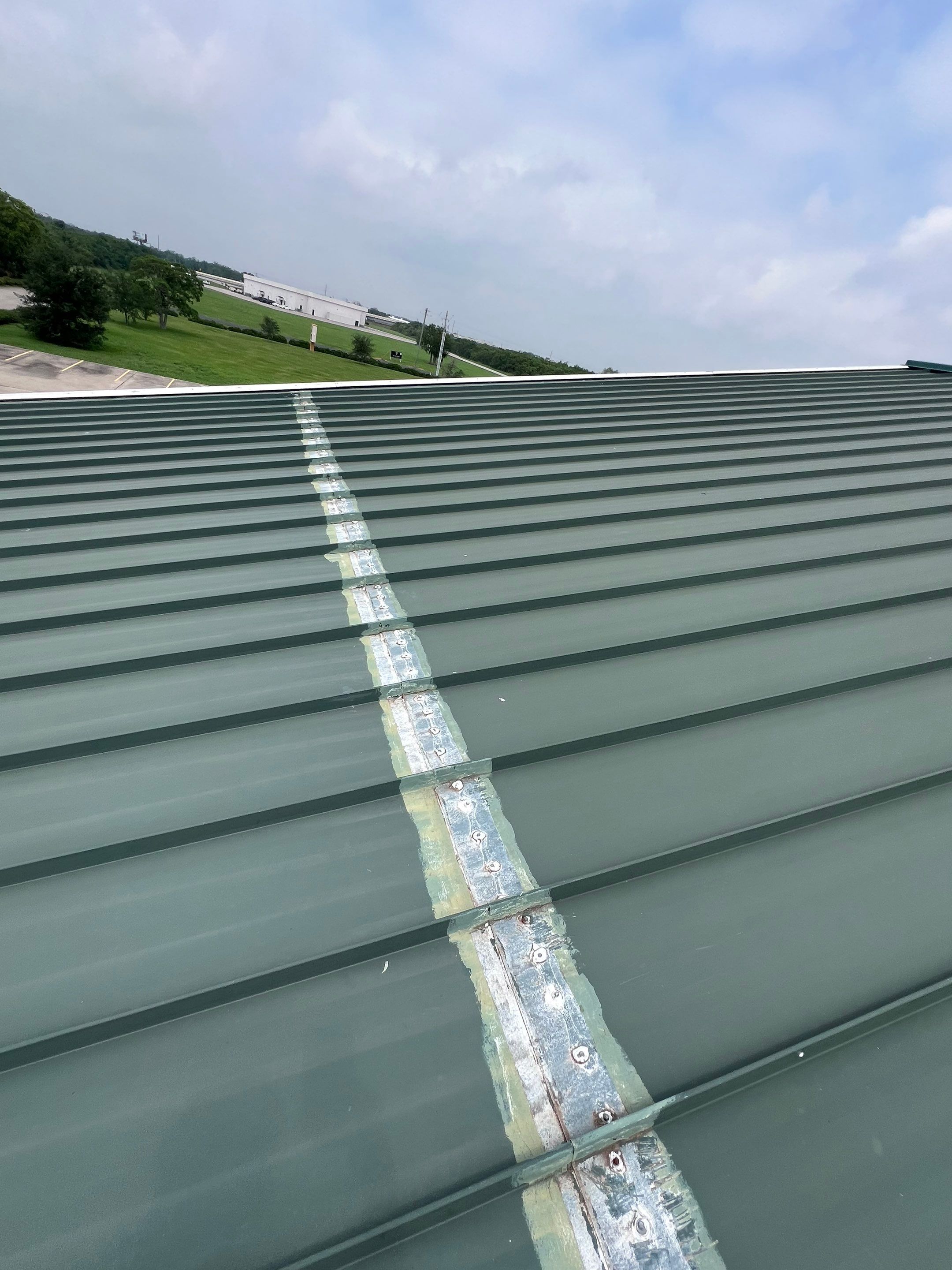 Hail Damage using Metal by Roof Repair Company